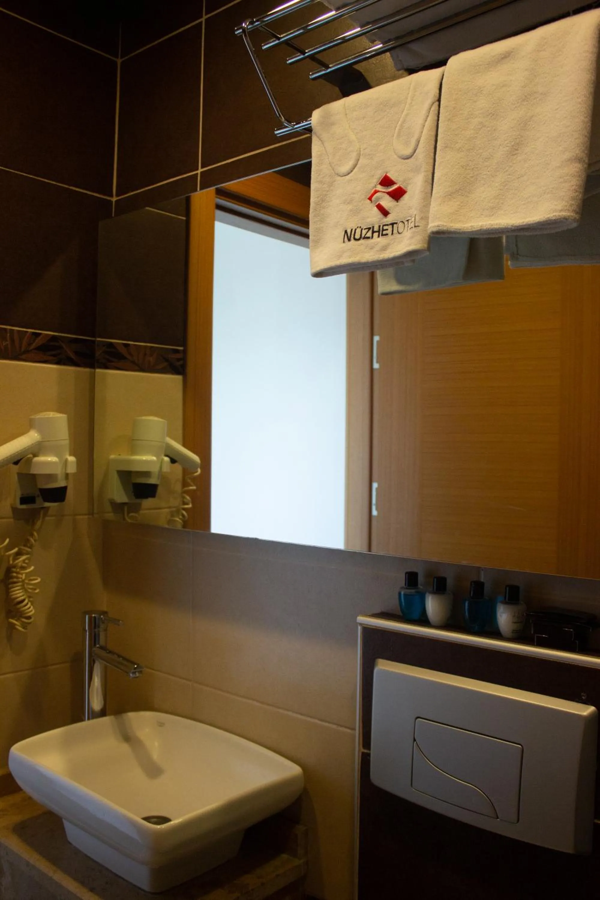 Toilet in Nüzhet Hotel