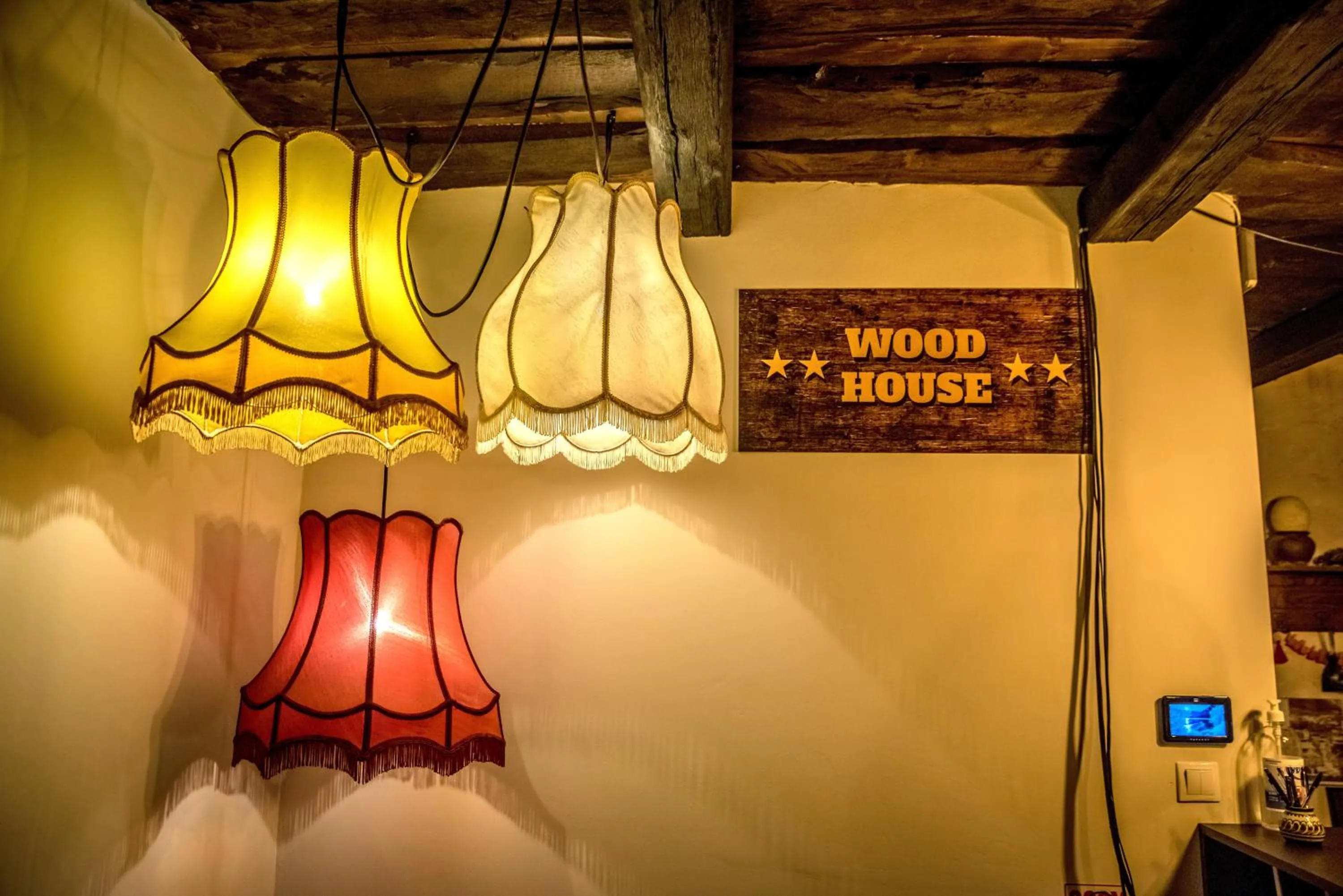 Property logo or sign in Wood House Republicii