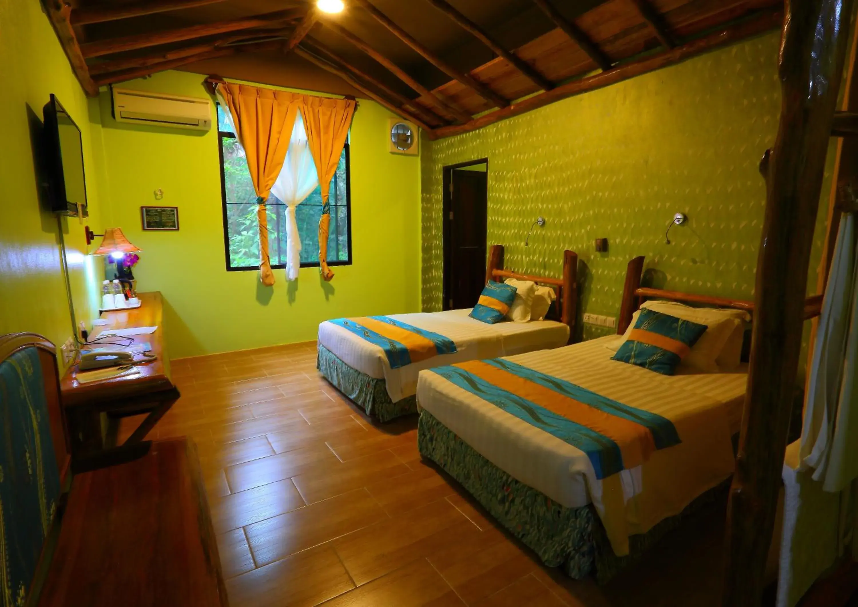 Mahogany Standard Room in Borneo Tropical Rainforest Resort Mahogany Standard Room in Borneo Tropical Rainforest Resort