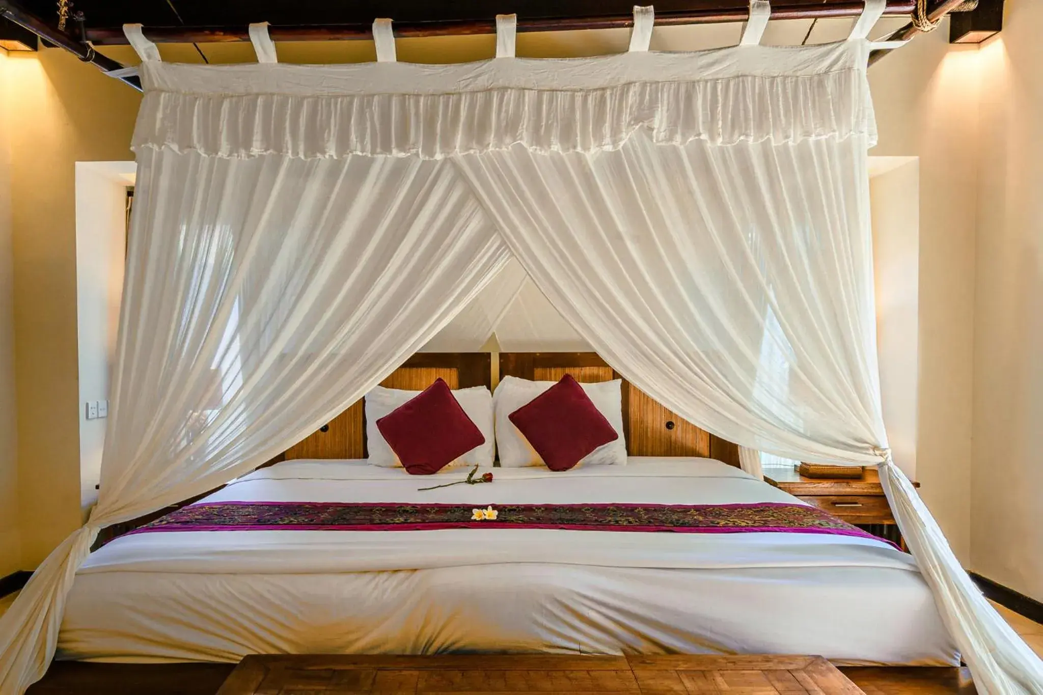 Bed in Barong Resort Ubud by Puri Signatures Bed in Barong Resort Ubud by Puri Signatures
