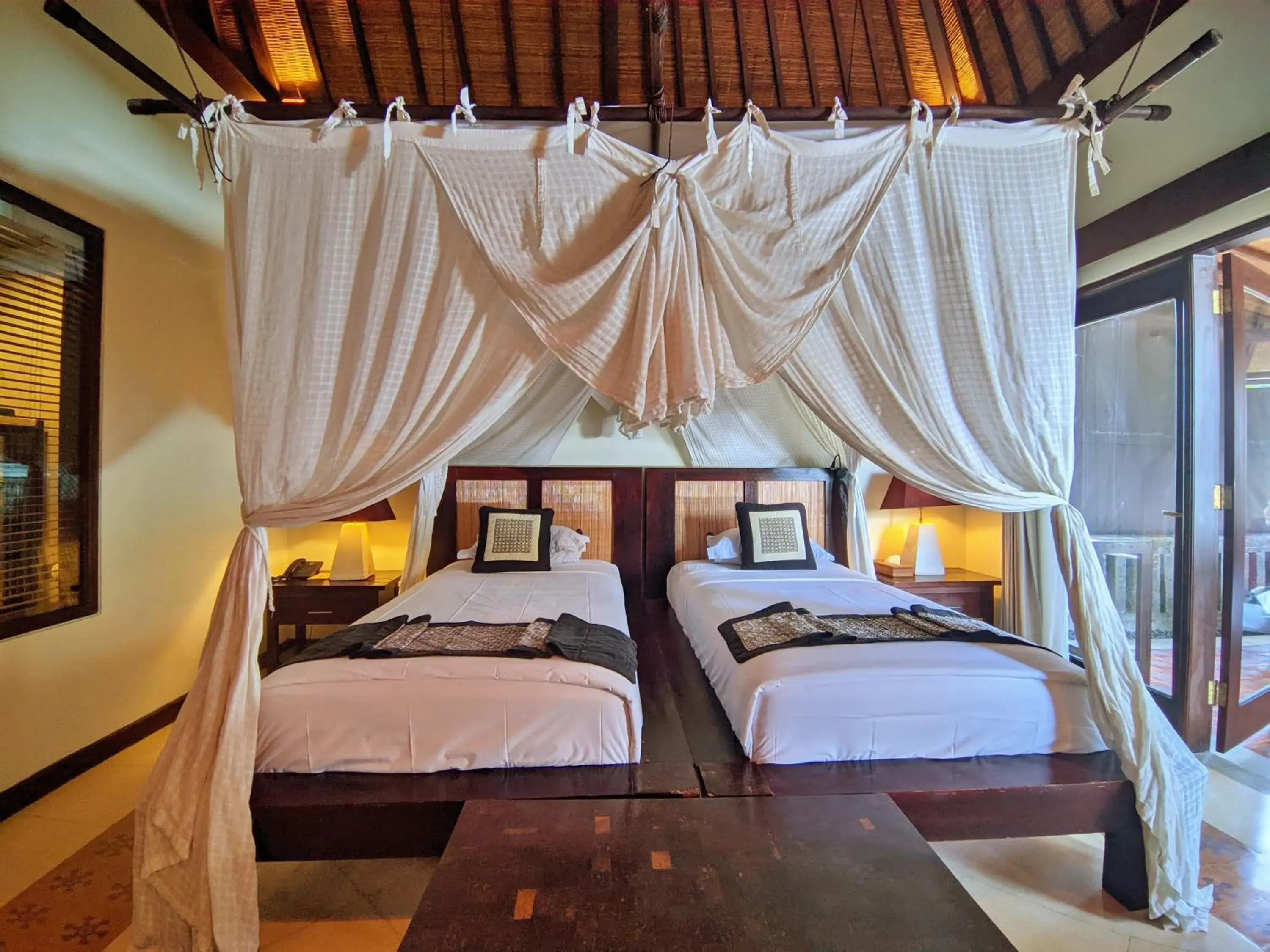 Bed in Barong Resort Ubud by Puri Signatures Bed in Barong Resort Ubud by Puri Signatures