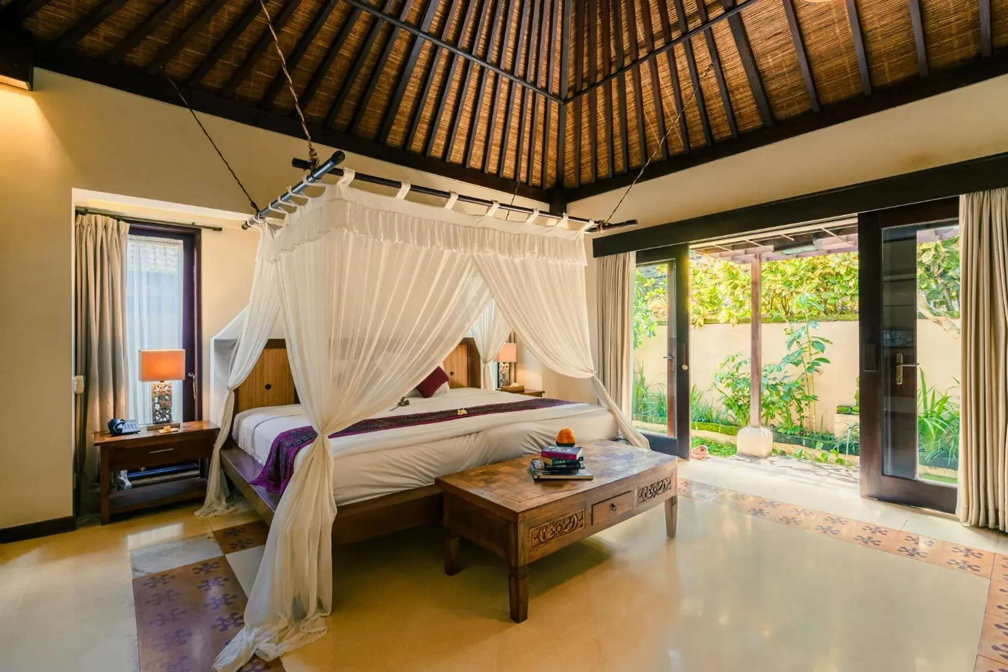 Bed in Barong Resort Ubud by Puri Signatures Bed in Barong Resort Ubud by Puri Signatures