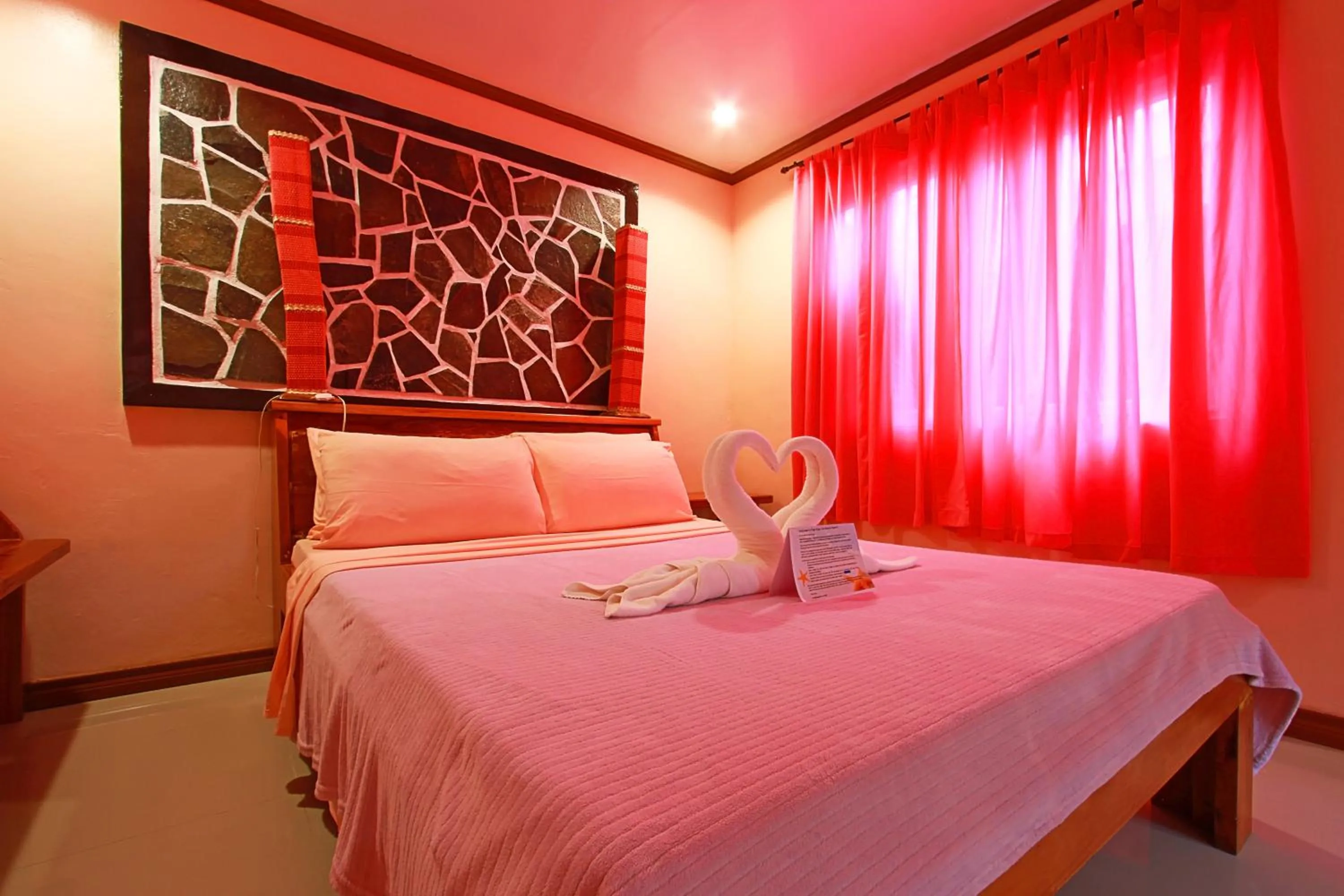 Bed in Nigi Nigi Too Beach Resort