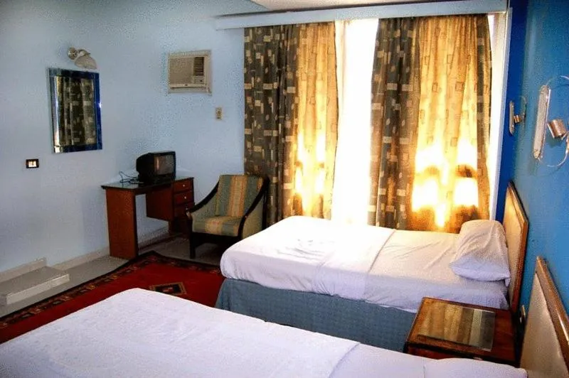 Bed in Nile Zamalek Hotel