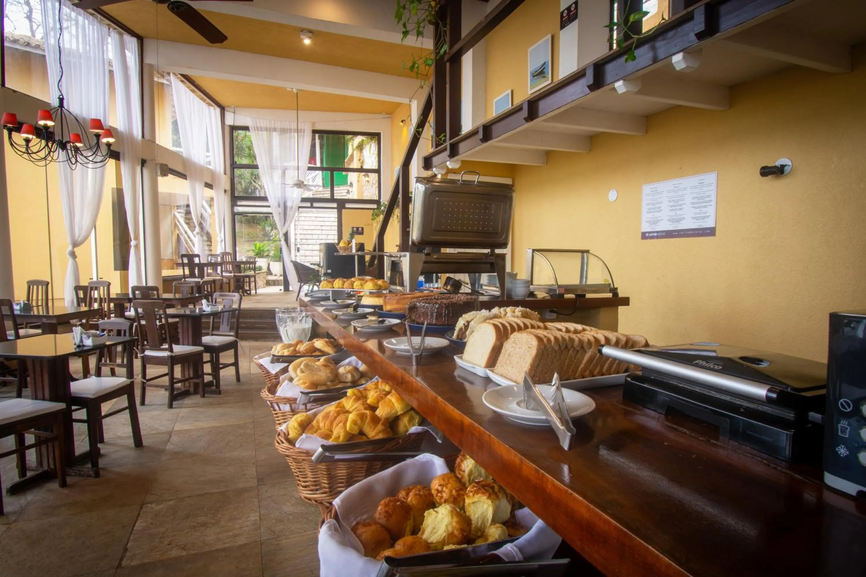 Food and drinks in Pousada e Spa Villa Mercedes by Latitud Hoteles