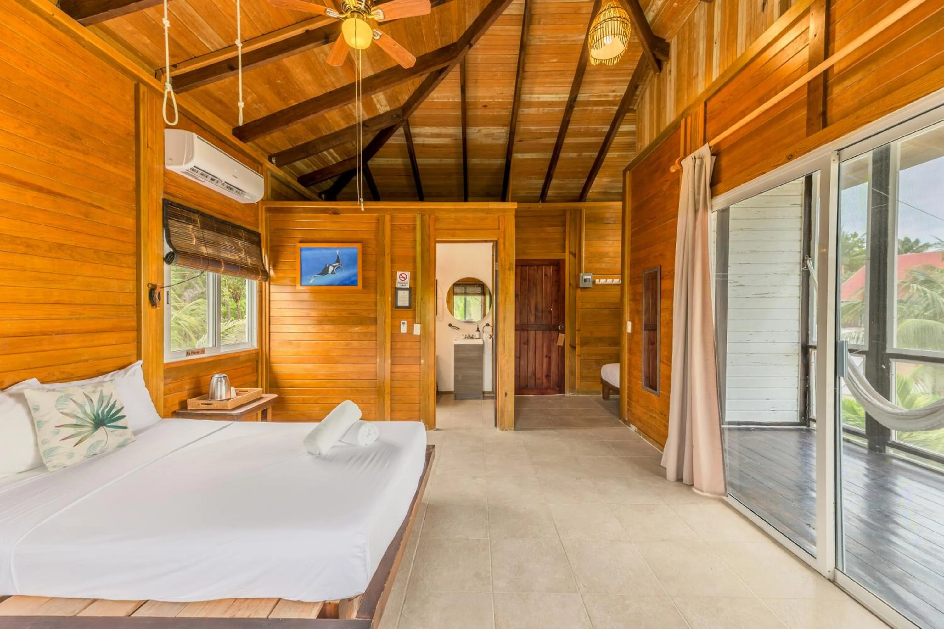 Bed in Tekio Beach Hotel