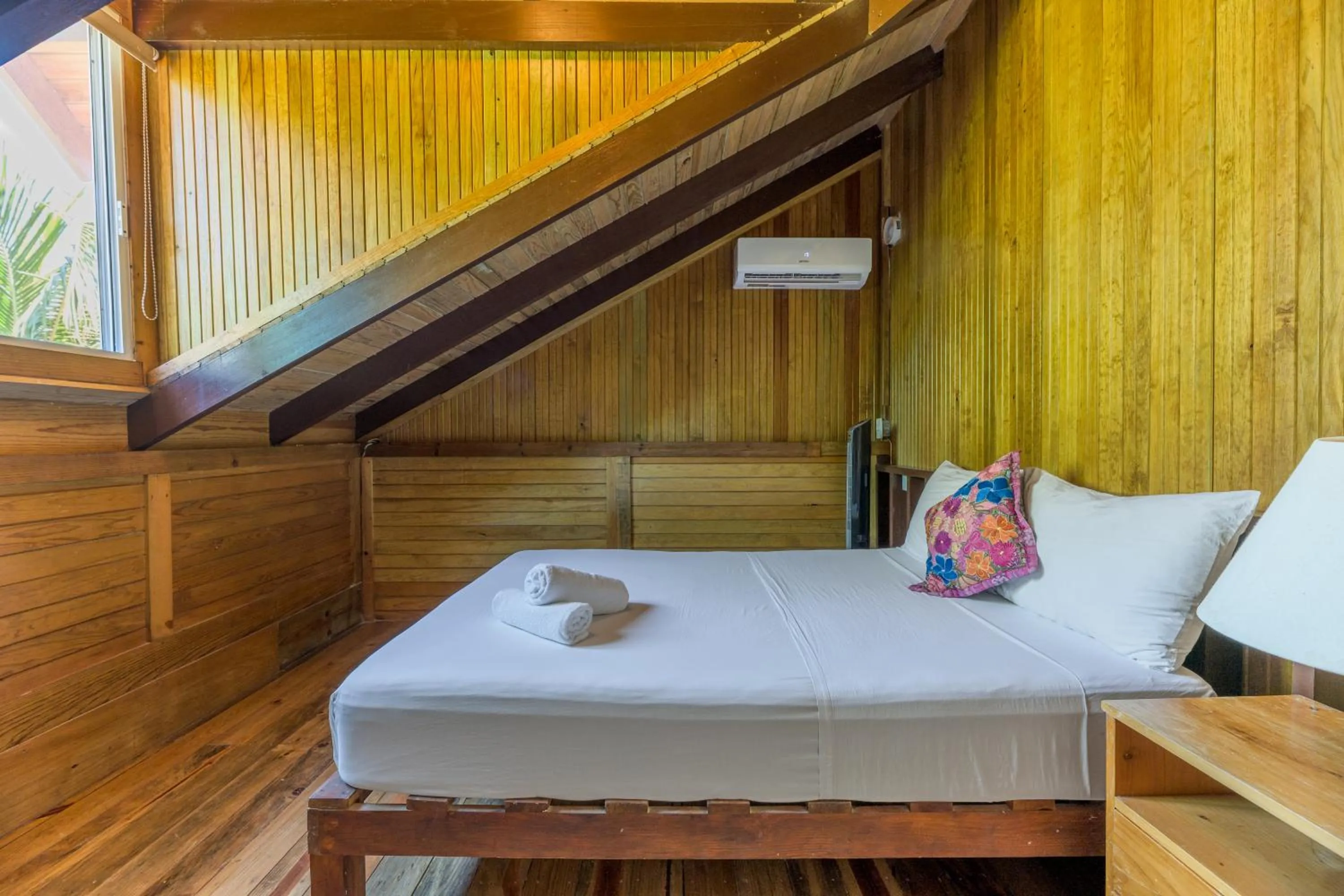 Bed in Tekio Beach Hotel