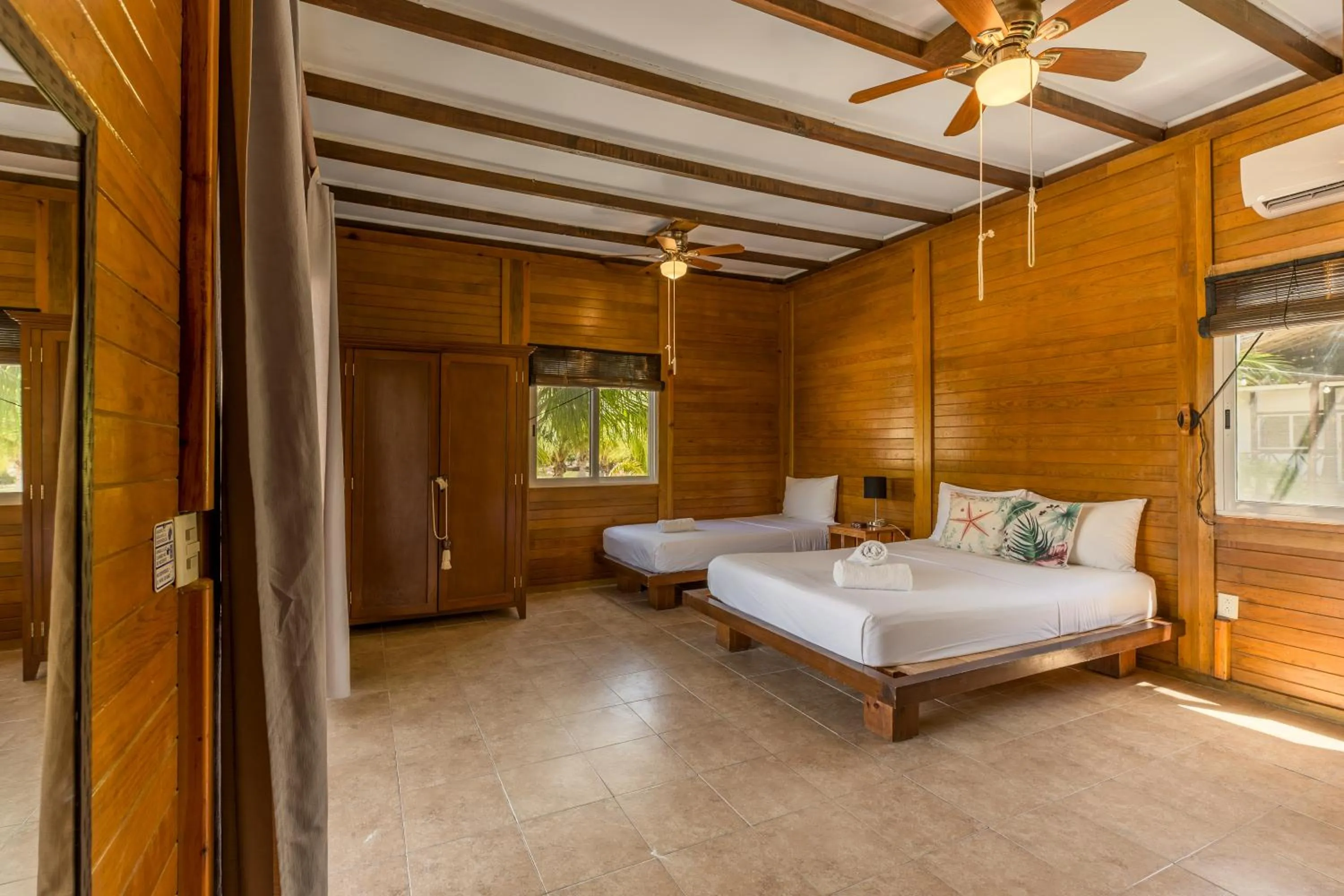 Bed in Tekio Beach Hotel