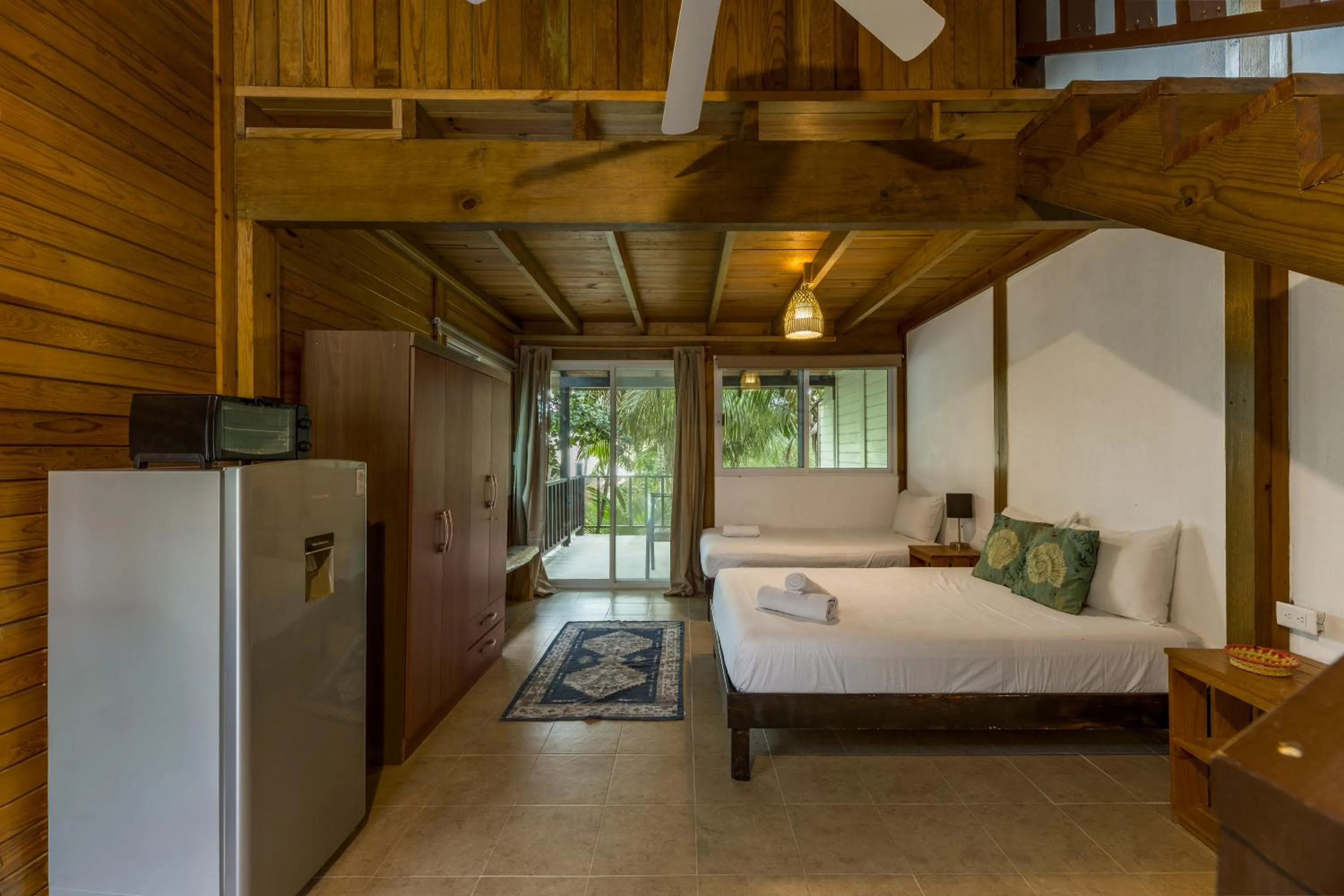 Bed in Tekio Beach Hotel