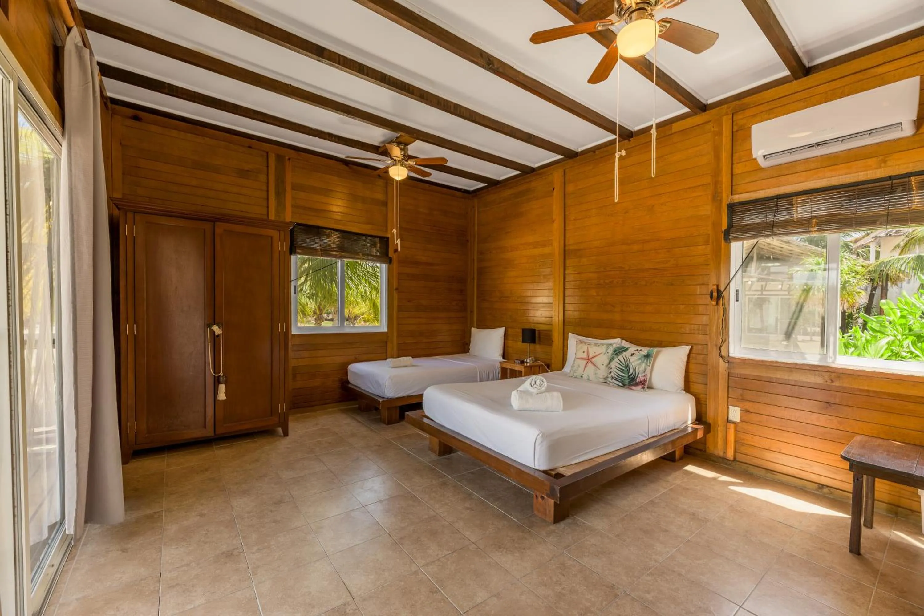 Bed in Tekio Beach Hotel