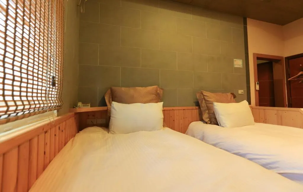 Bed in Wanli Spa & Resort
