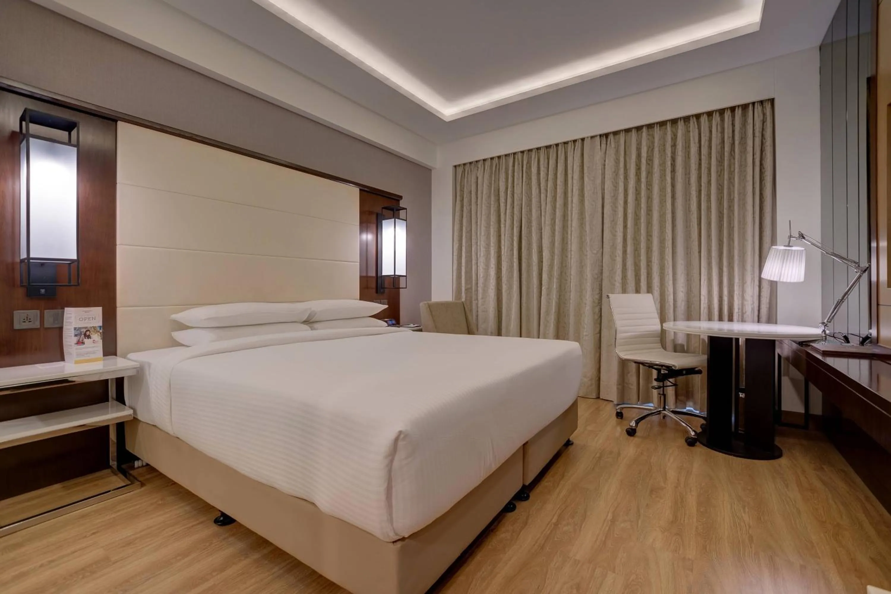 Photo of the whole room, Bed in Courtyard by Marriott Surat