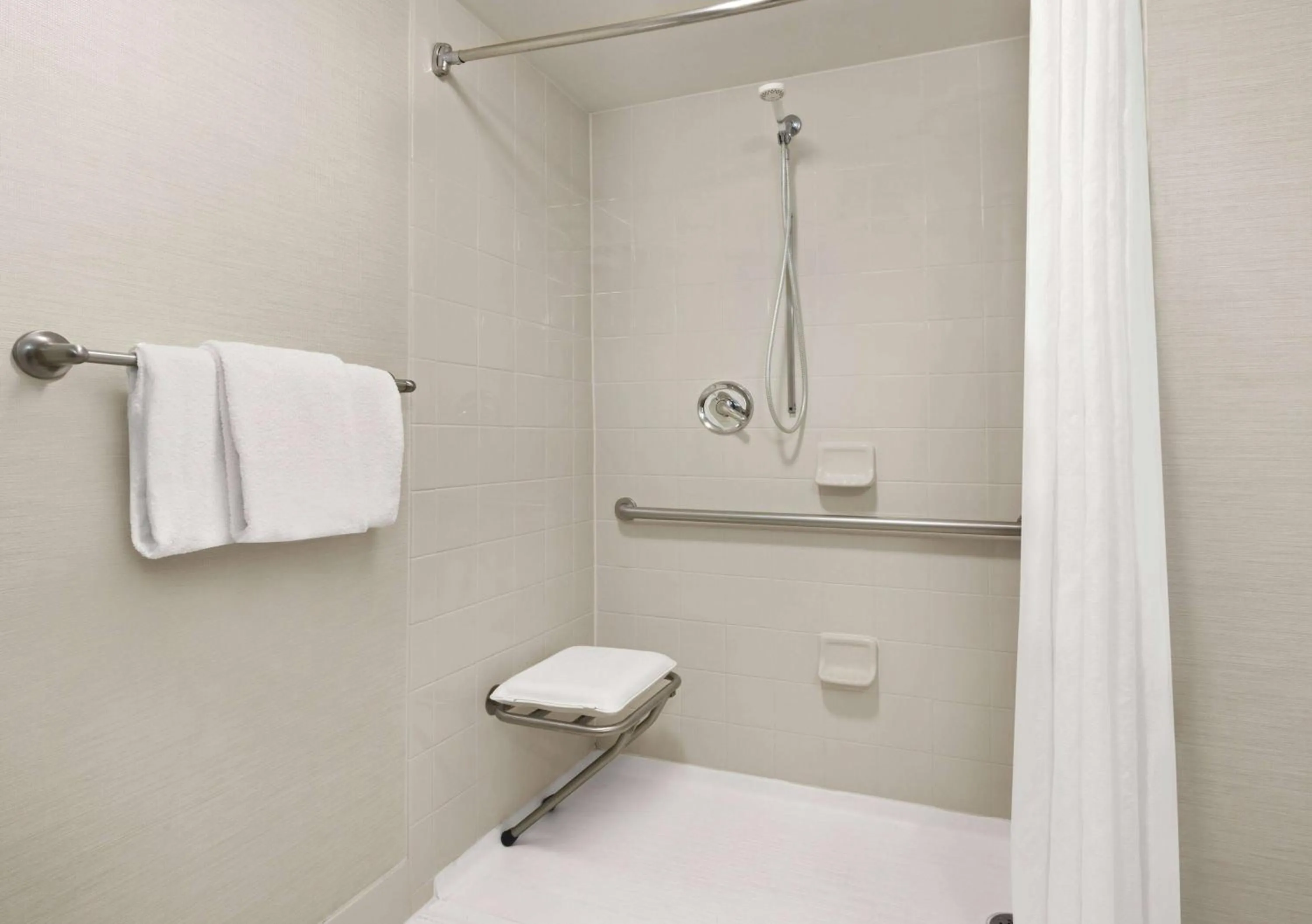 Bathroom in Super 8 by Wyndham Dallas Love Field Airport