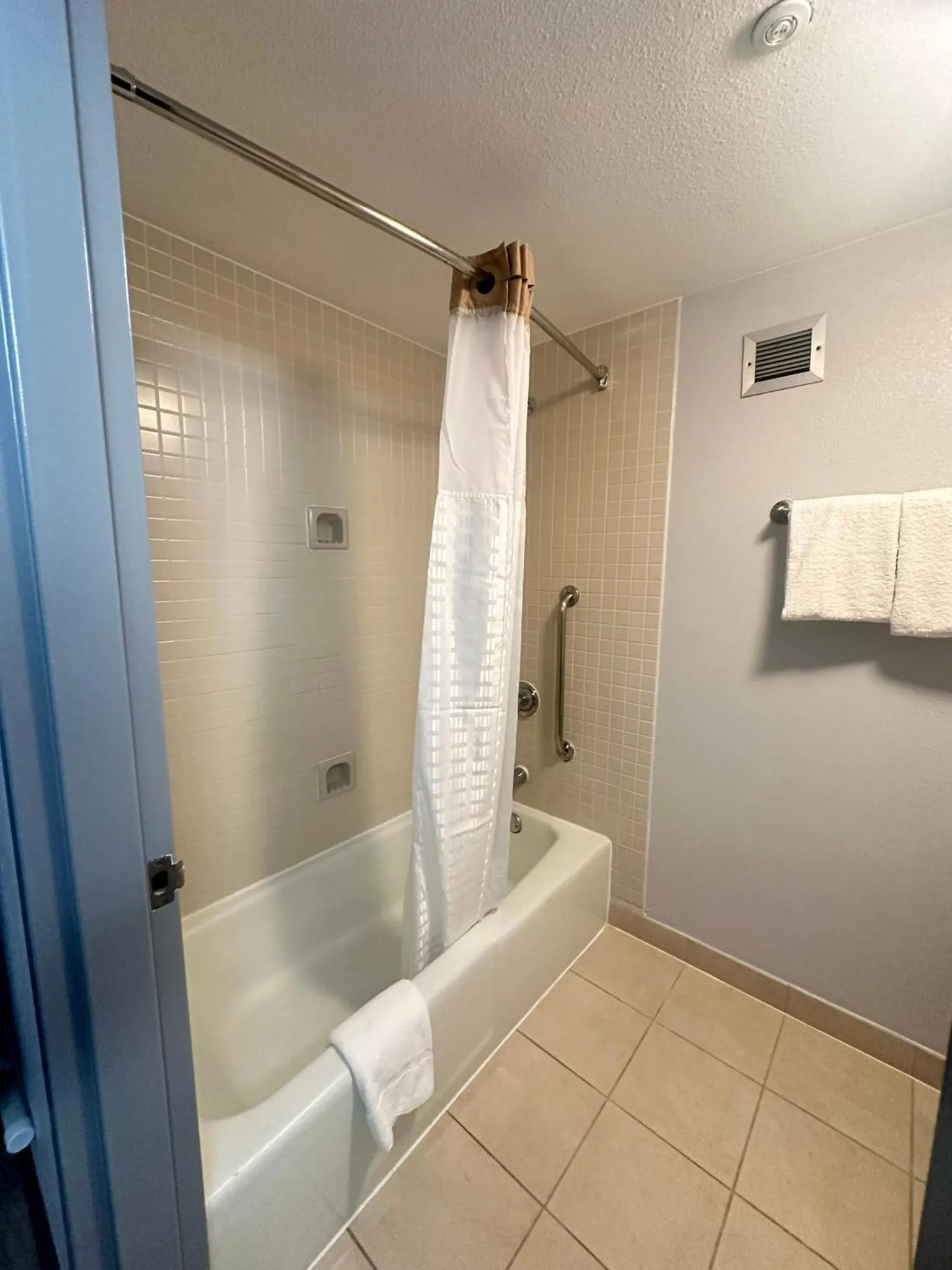 Bathroom in Super 8 by Wyndham Dallas Love Field Airport