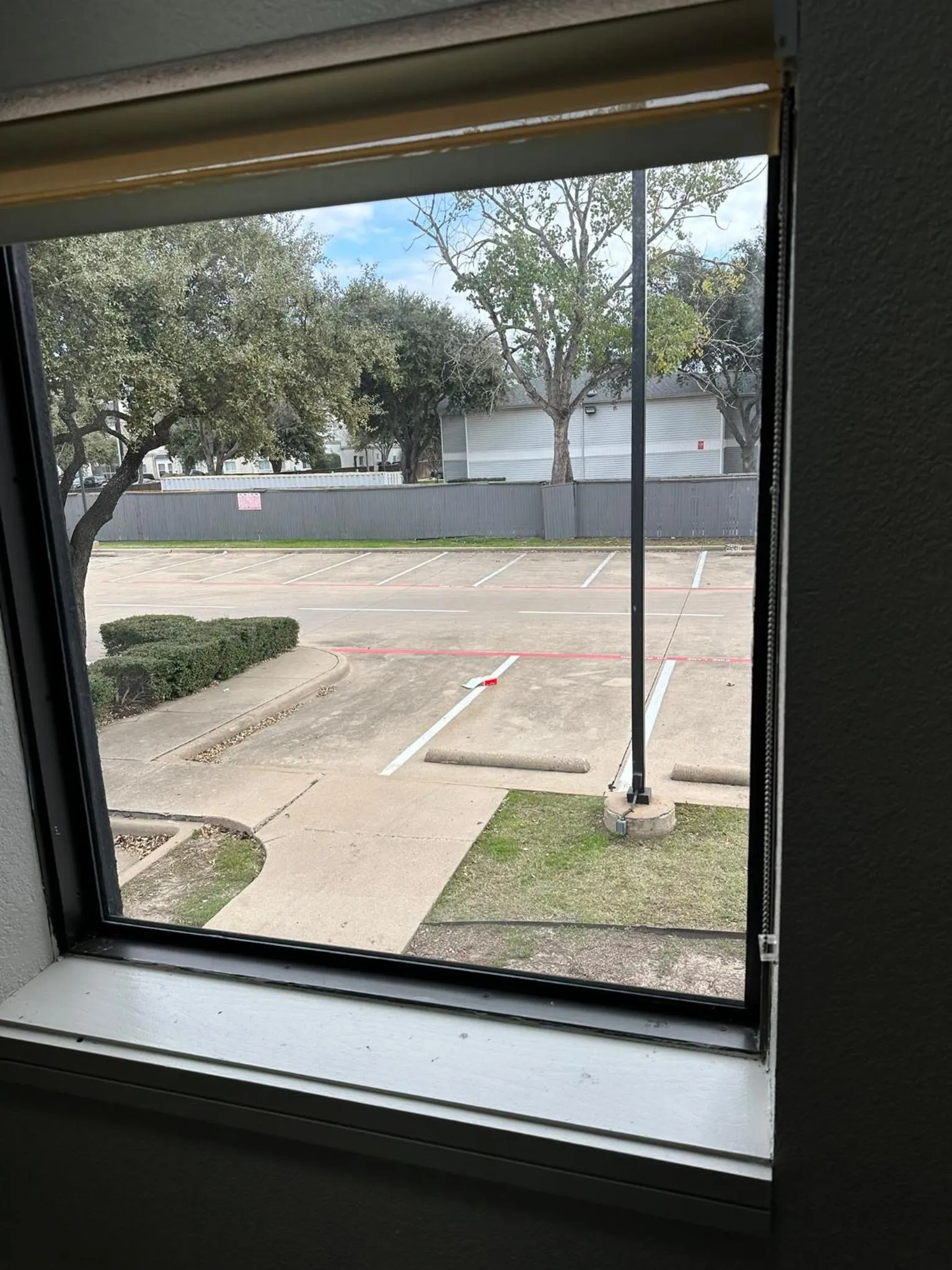 Property building in Super 8 by Wyndham Dallas Love Field Airport