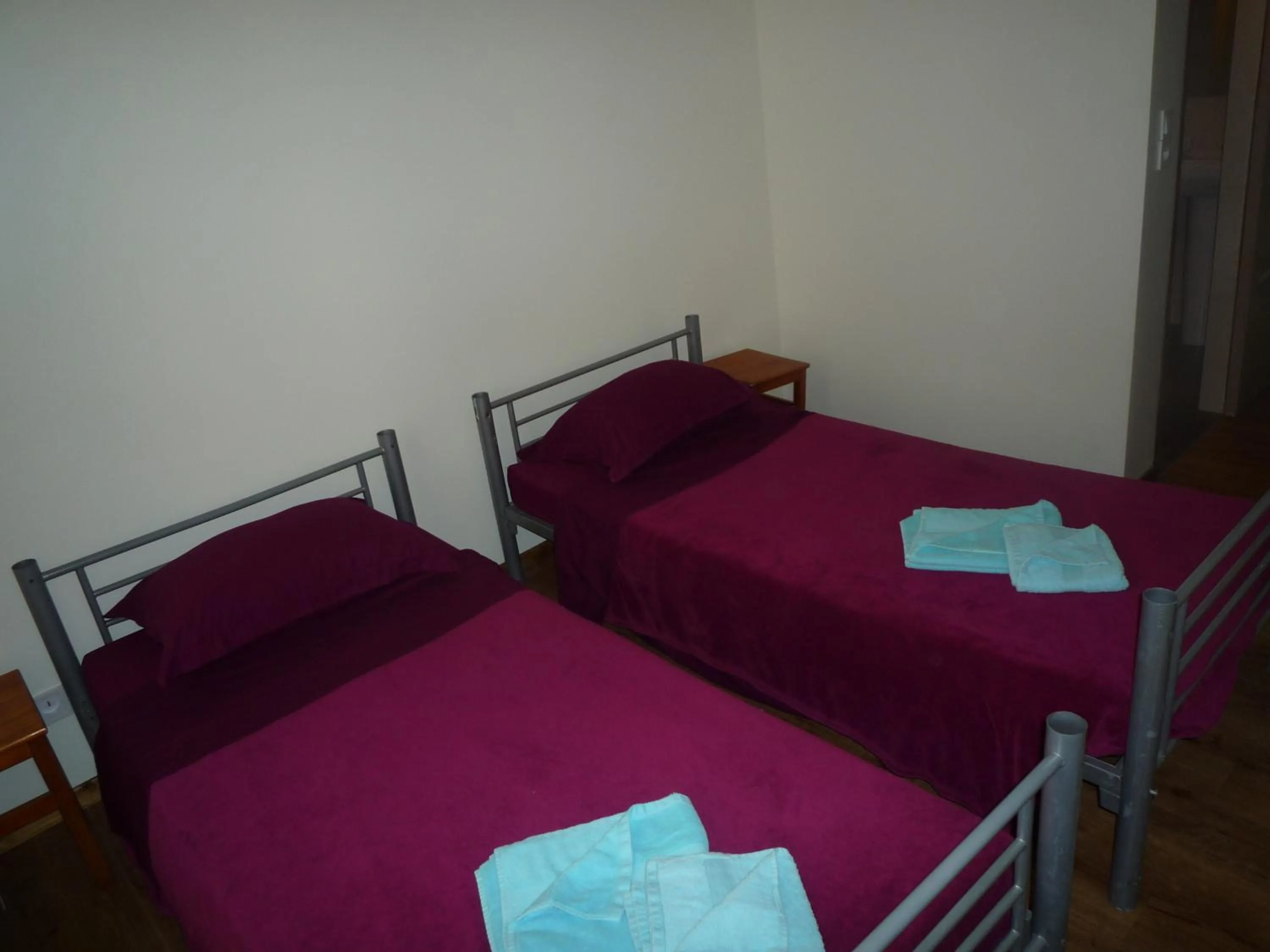 Bed in Hôtel Lyonnais