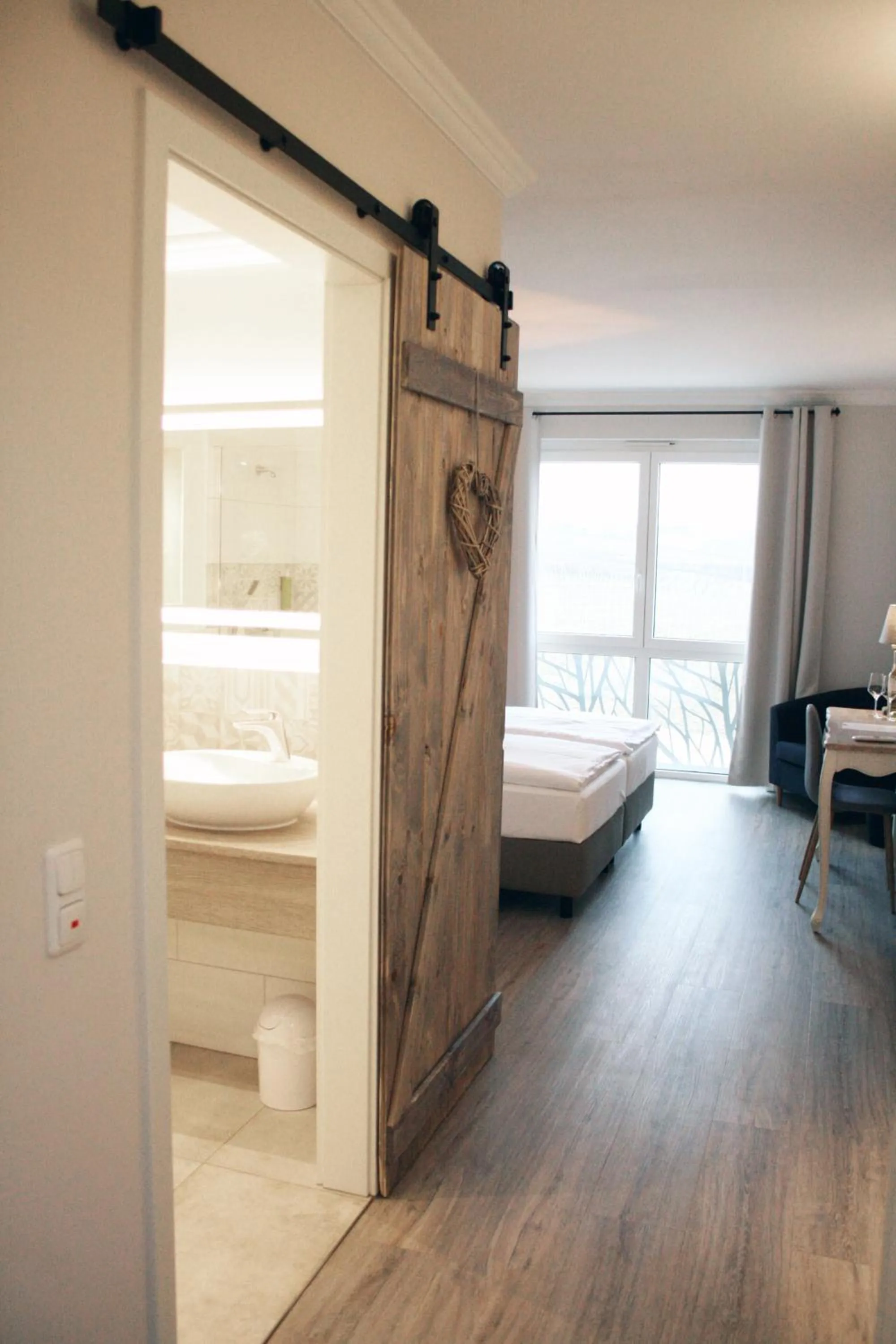 Photo of the whole room, Bed in Winzerhotel Trautwein