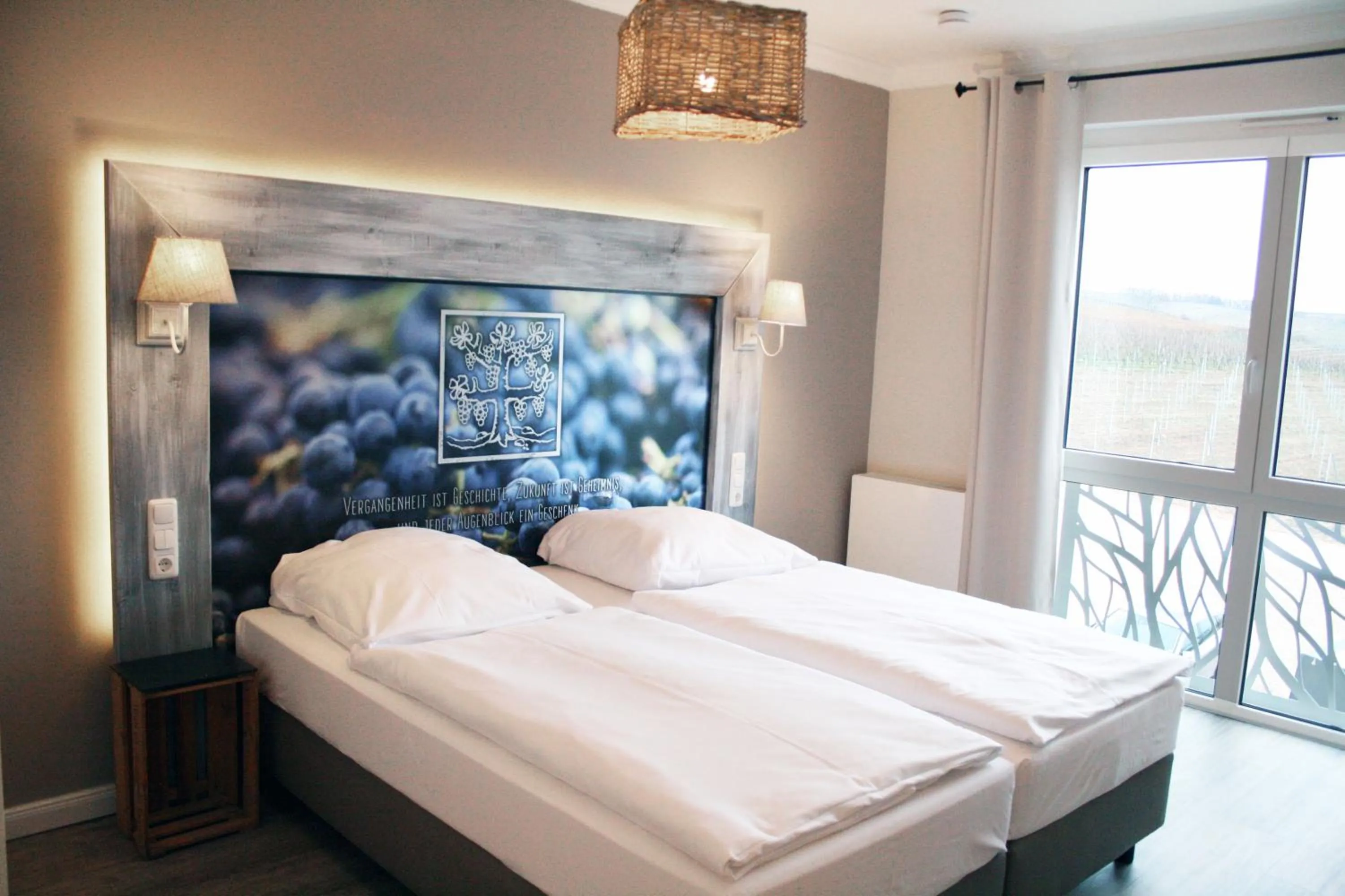 Photo of the whole room, Bed in Winzerhotel Trautwein