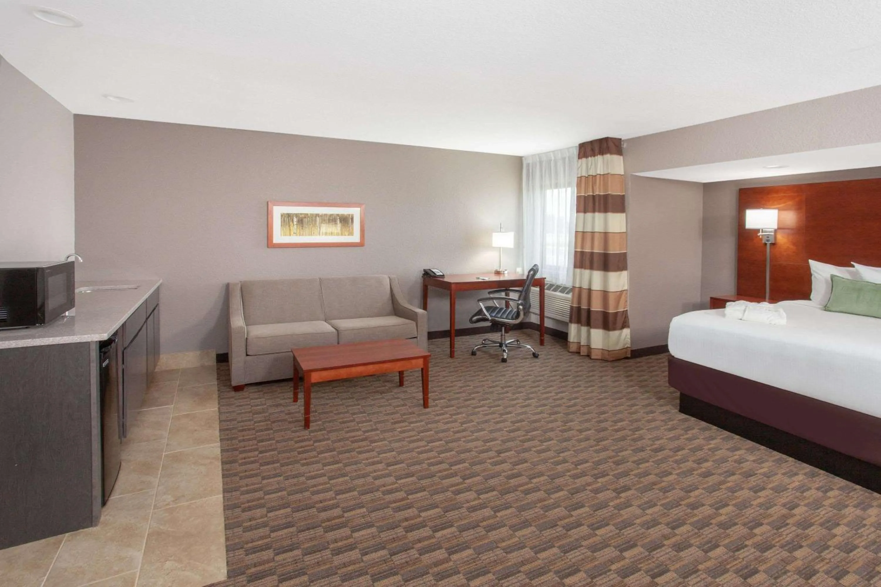 Photo of the whole room, Bed in Wyndham Garden Fort Wayne