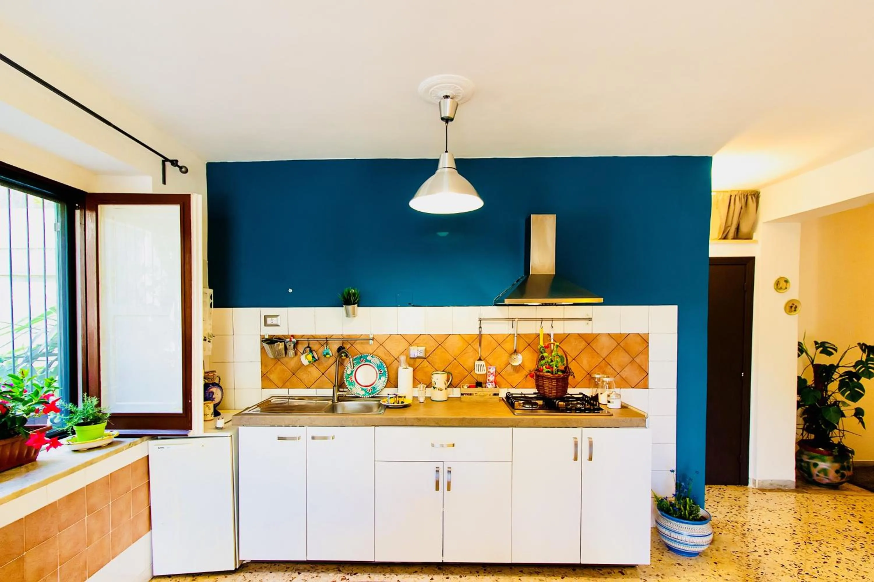 Kitchen or kitchenette in Casa Maria