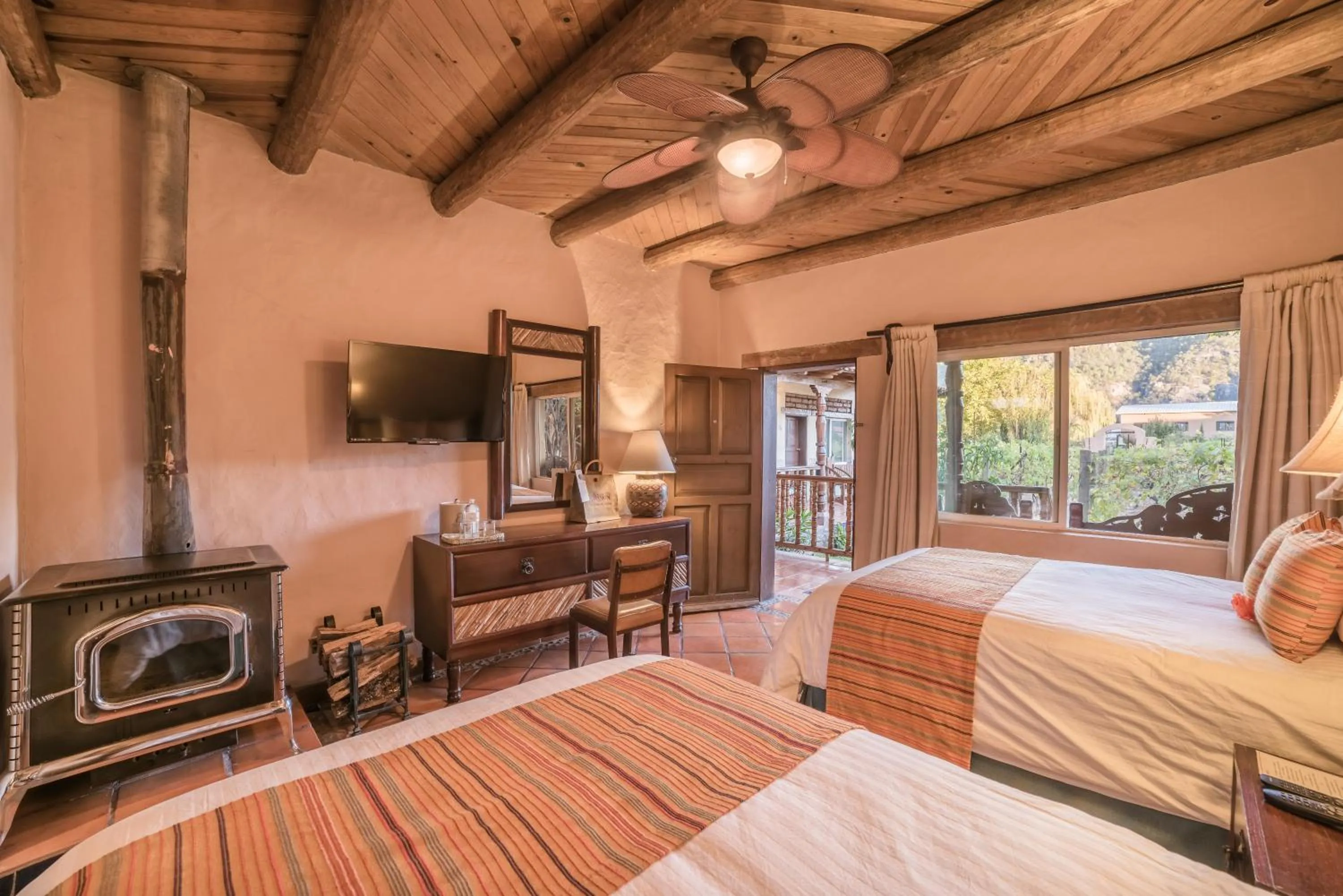 Bed in Hotel Misión Cerocahui a Balderrama Hotel Collection