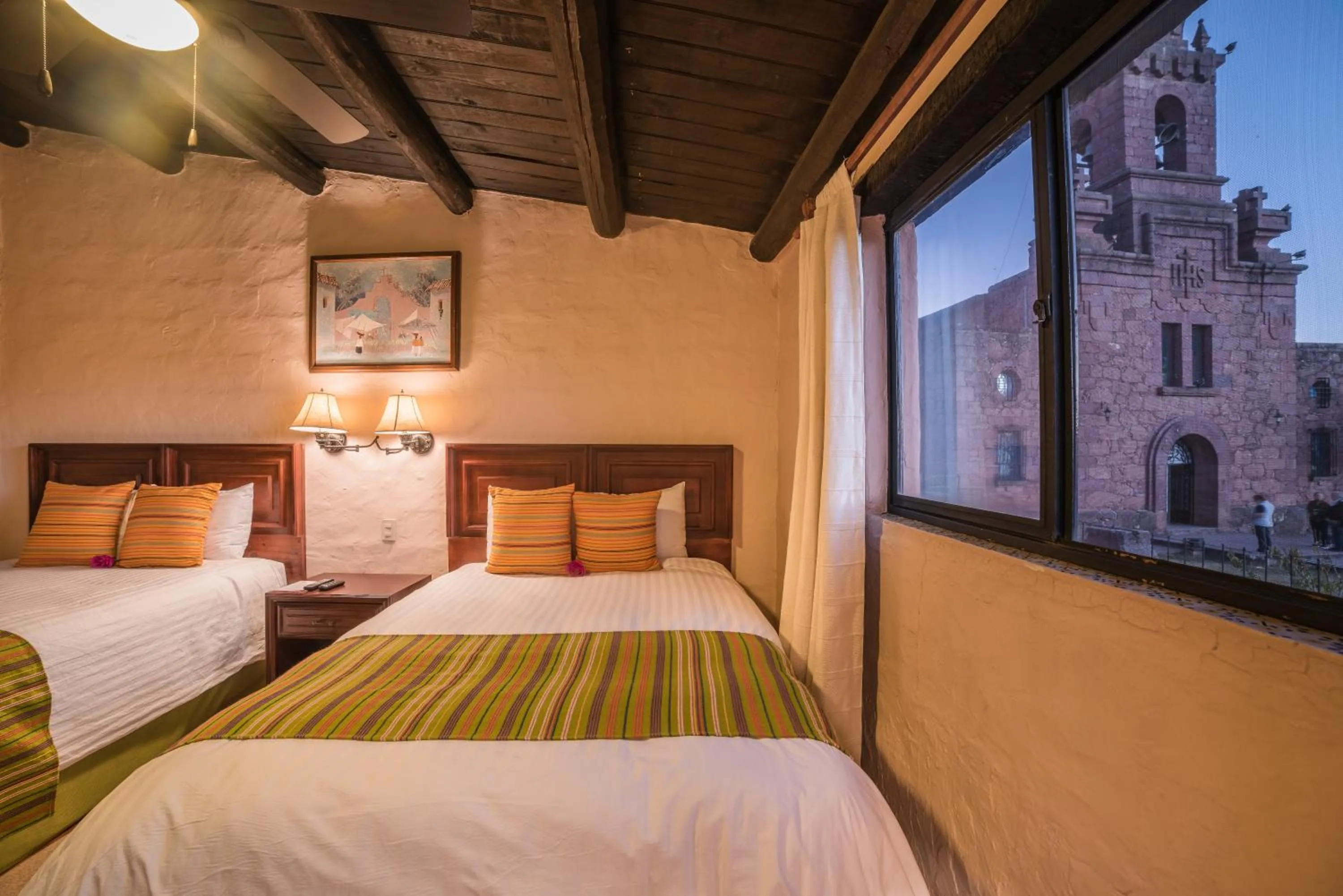 Bed in Hotel Misión Cerocahui a Balderrama Hotel Collection
