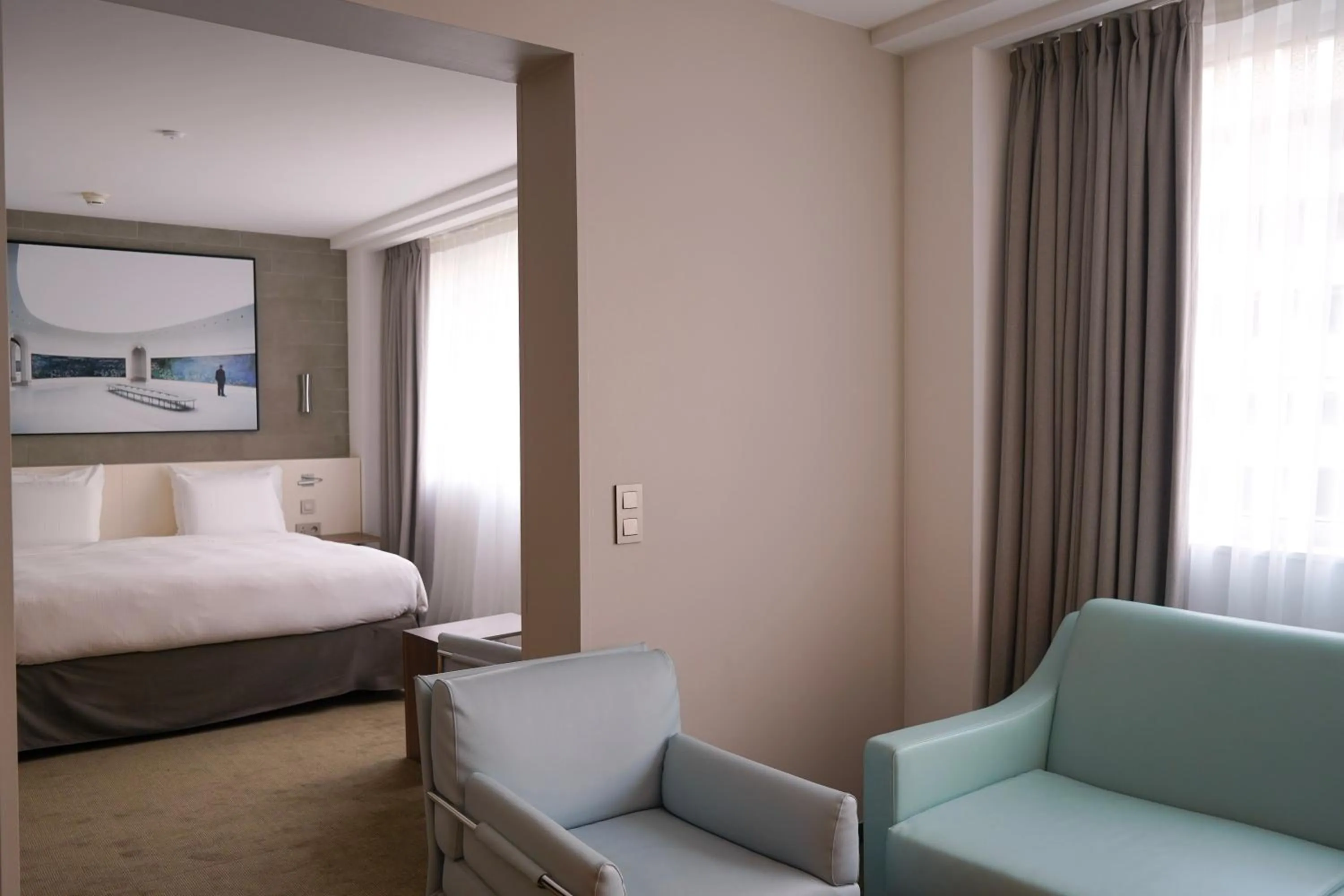 Living room, Bed in Pullman Paris Tour Eiffel