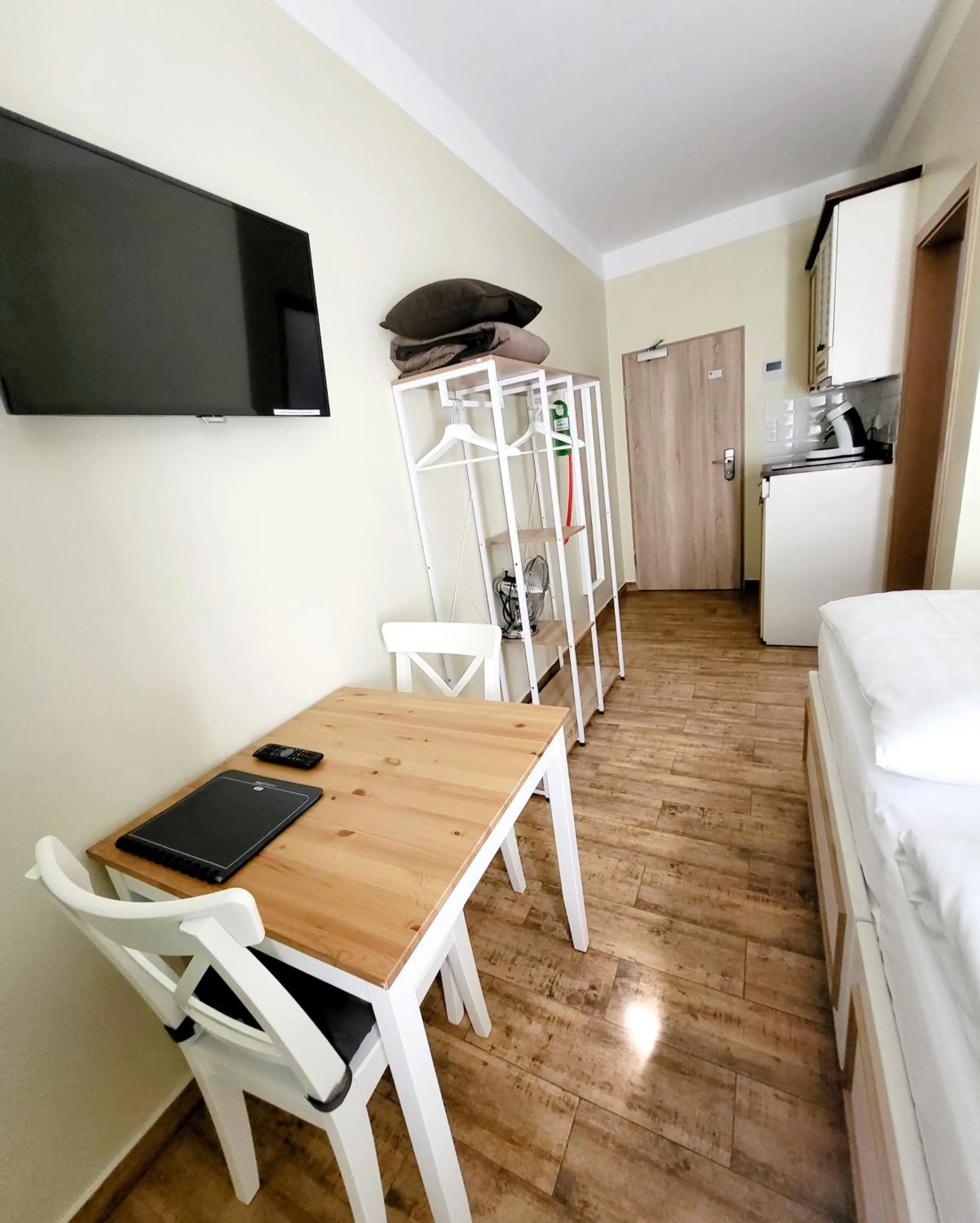 TV and multimedia, Bed in Marcel Apartments Leipzig