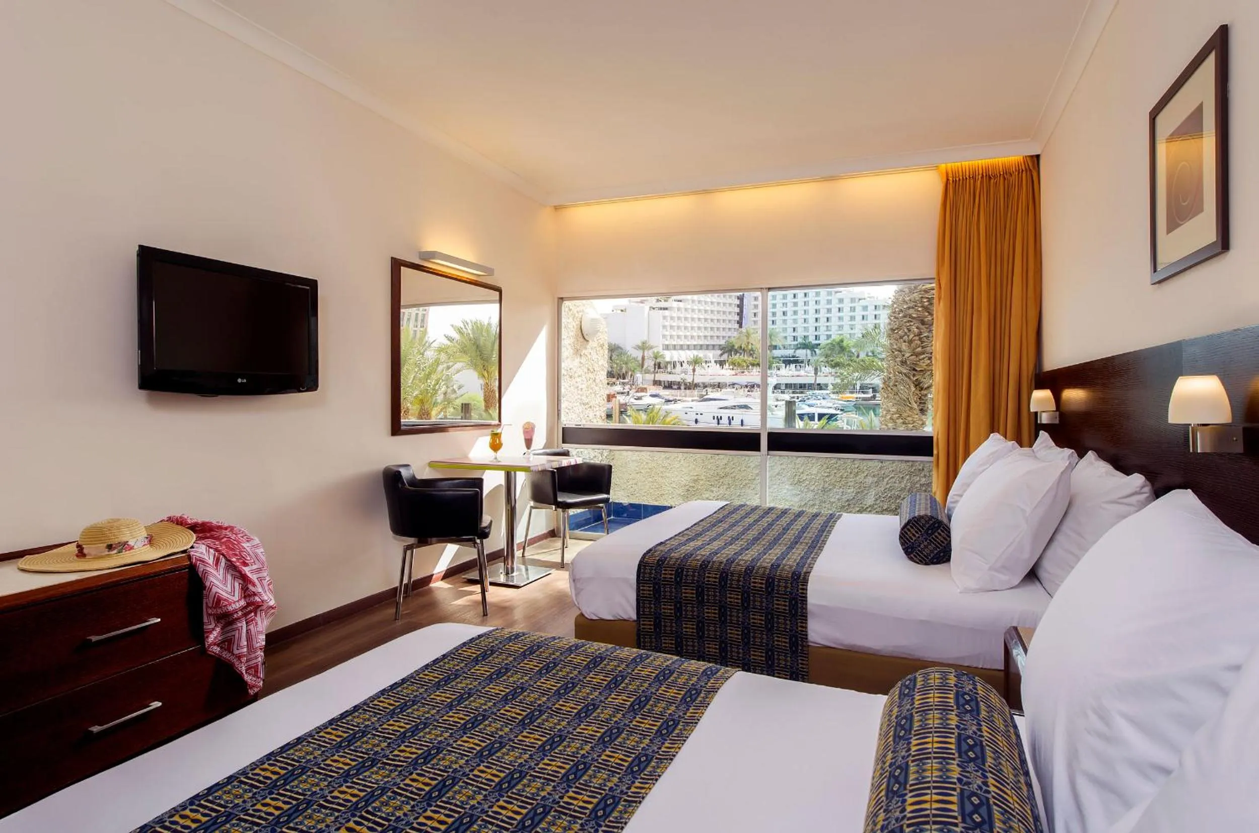 Bed in Caesar Premier Eilat Hotel