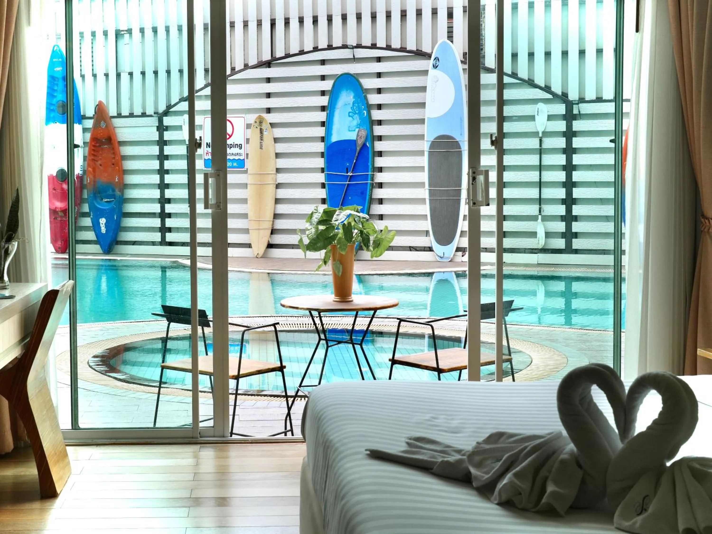 Pool view in A-Te Chumphon Hotel - SHA Plus