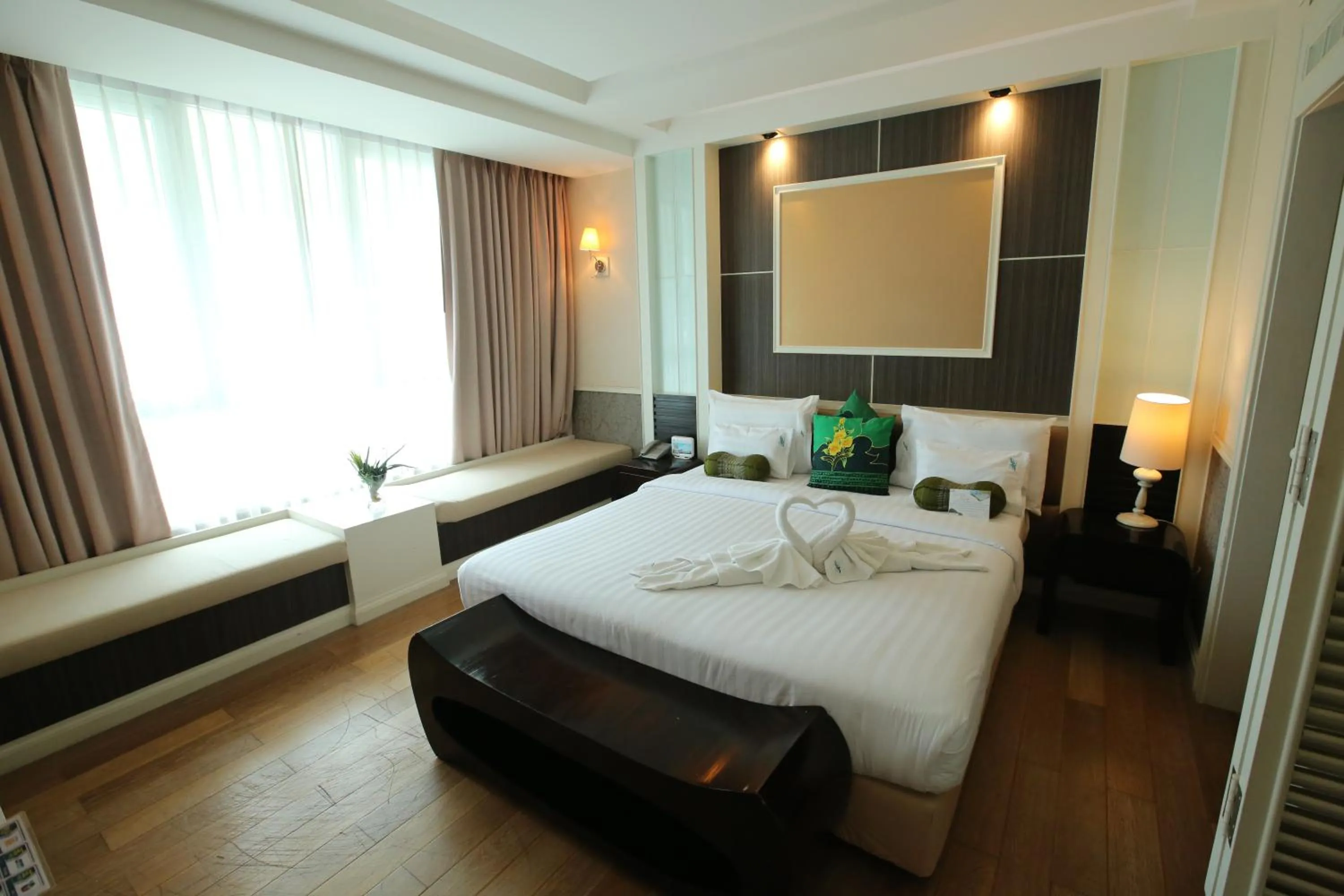 Photo of the whole room, Bed in A-Te Chumphon Hotel - SHA Plus