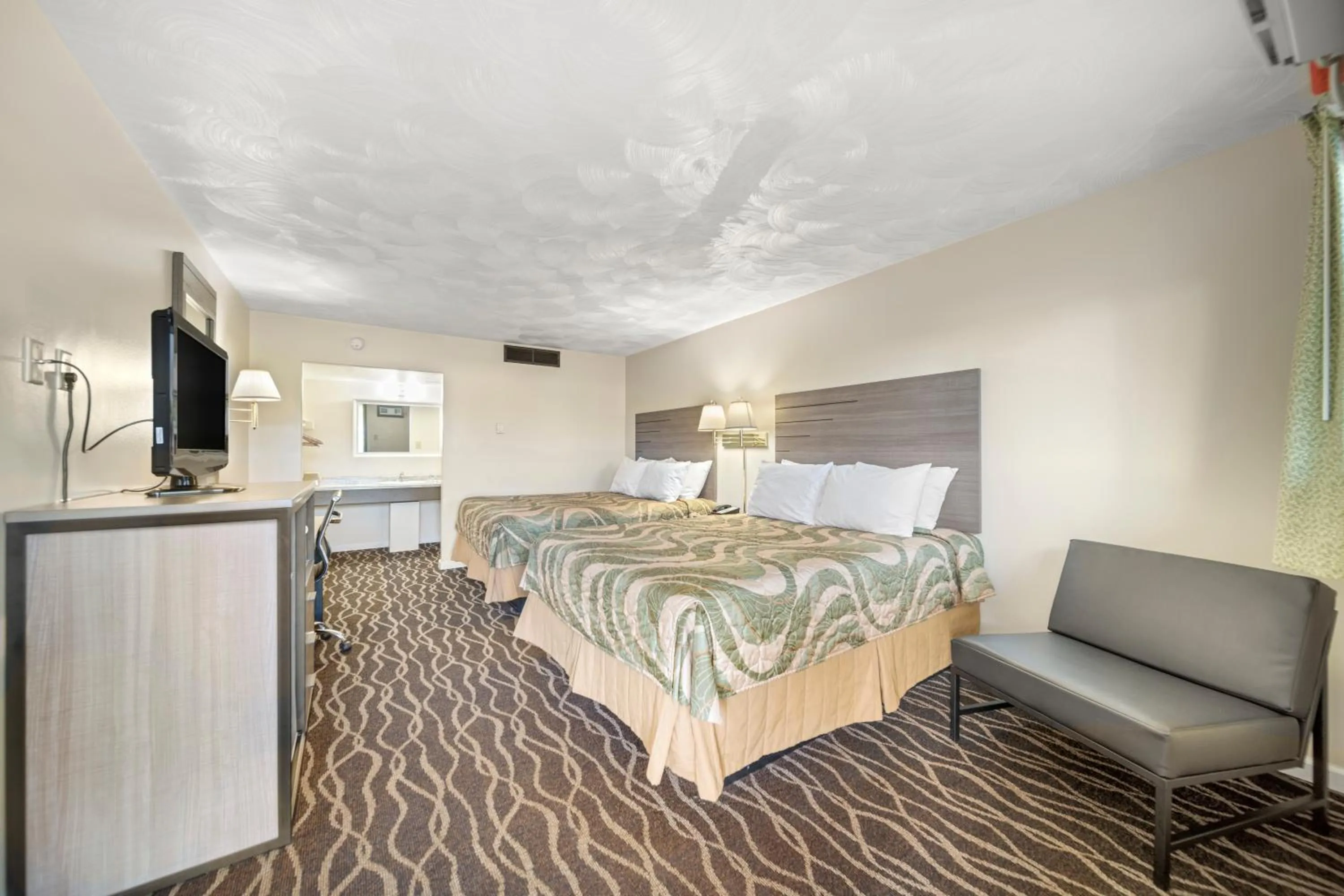 Bed in Park Drive Inn