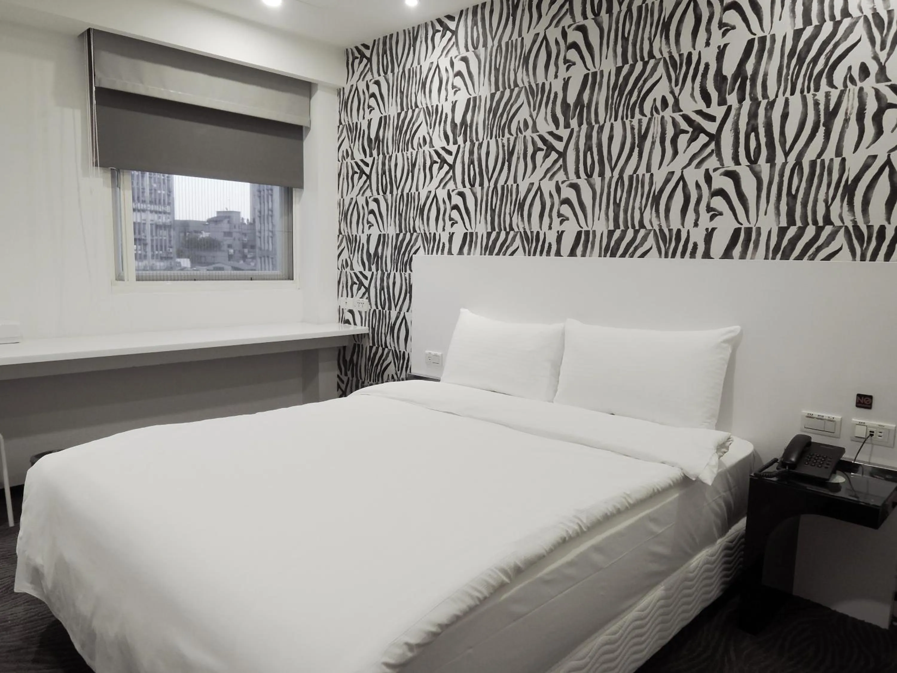 Bed in CHECK inn Express Taipei Yongkang