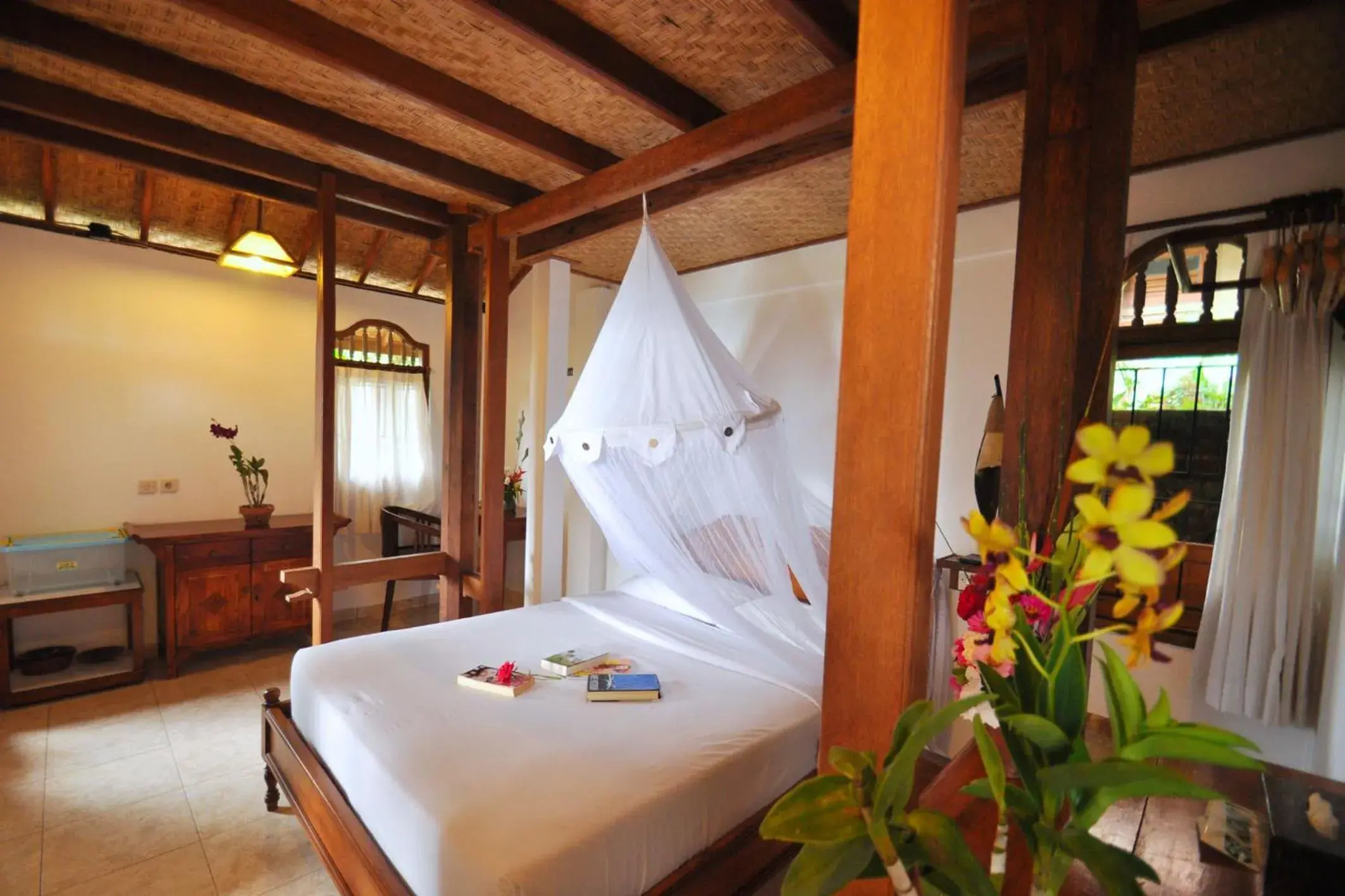 Bedroom, Bed in Puri Lumbung Cottages Restaurant & Spa Munduk Bedroom, Bed in Puri Lumbung Cottages Restaurant & Spa Munduk