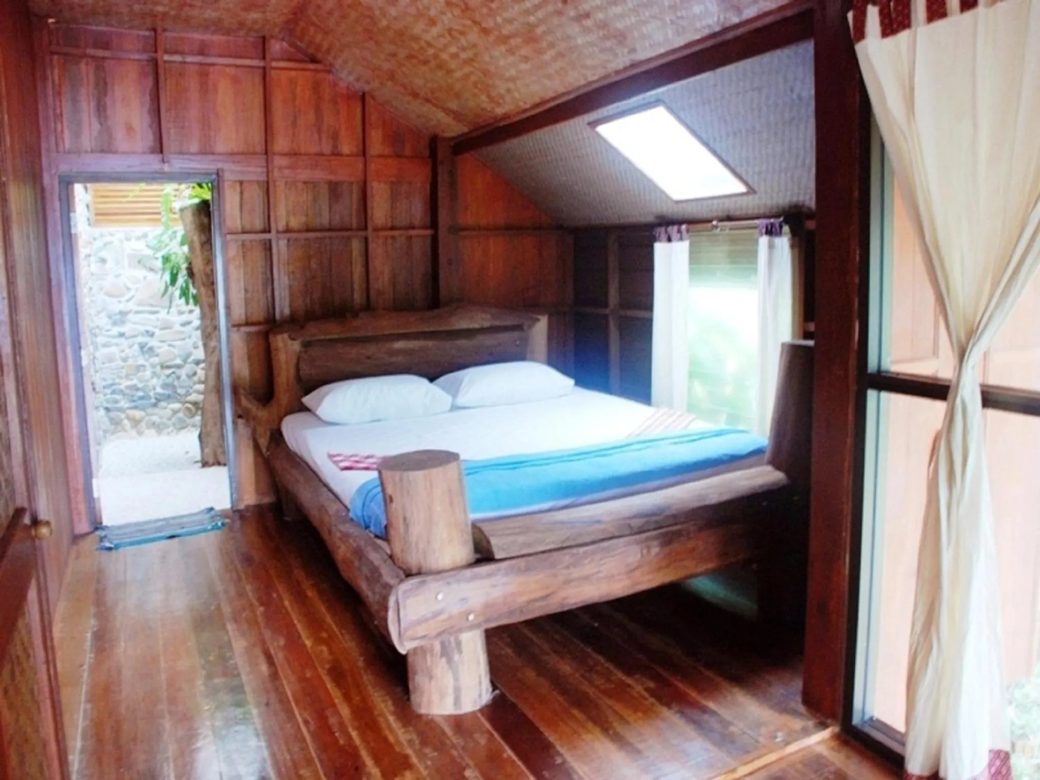 Bed in Phi Phi Sunset Bay Resort