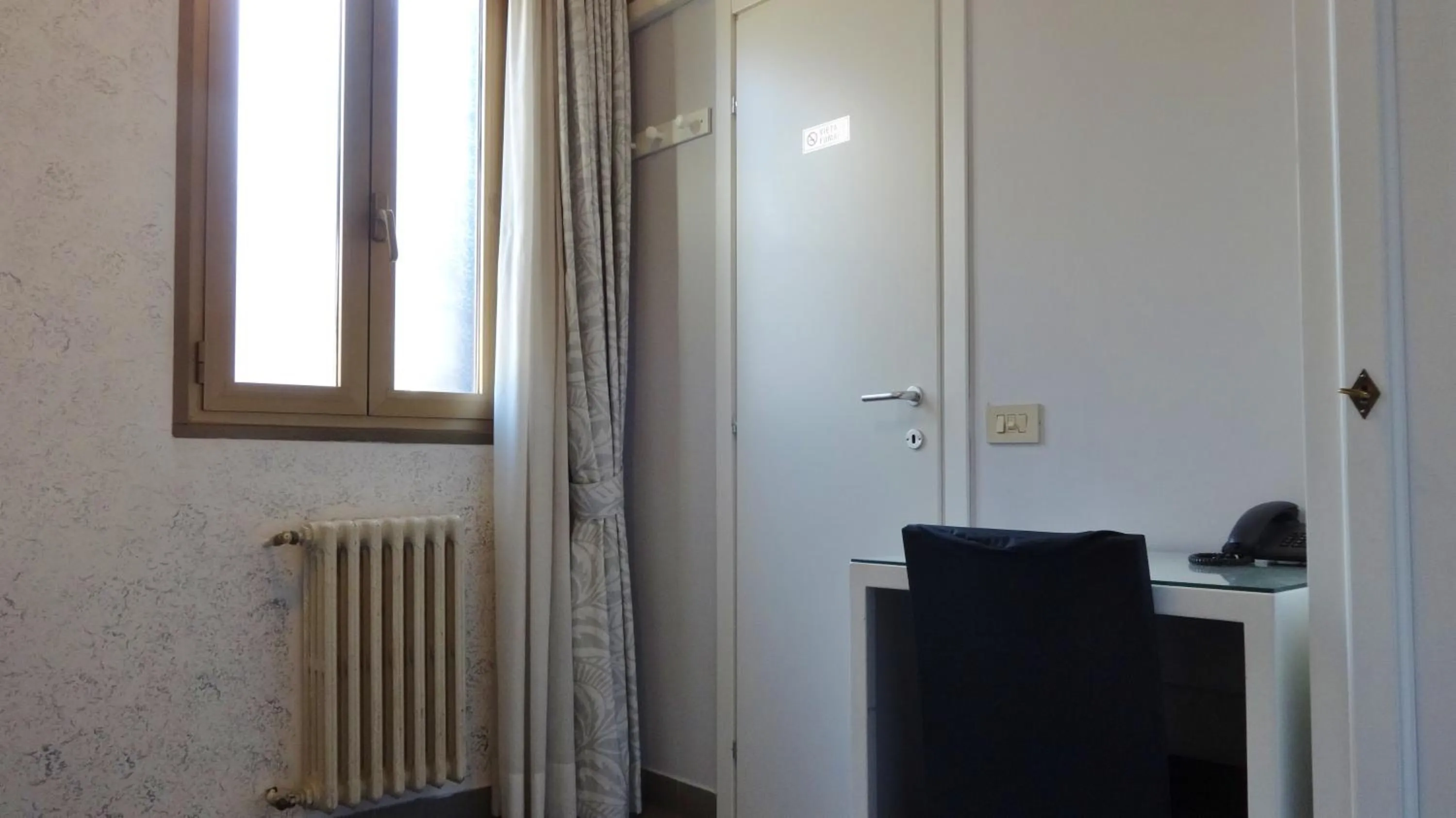 Seating area, TV/Entertainment Center in Hotel Marte