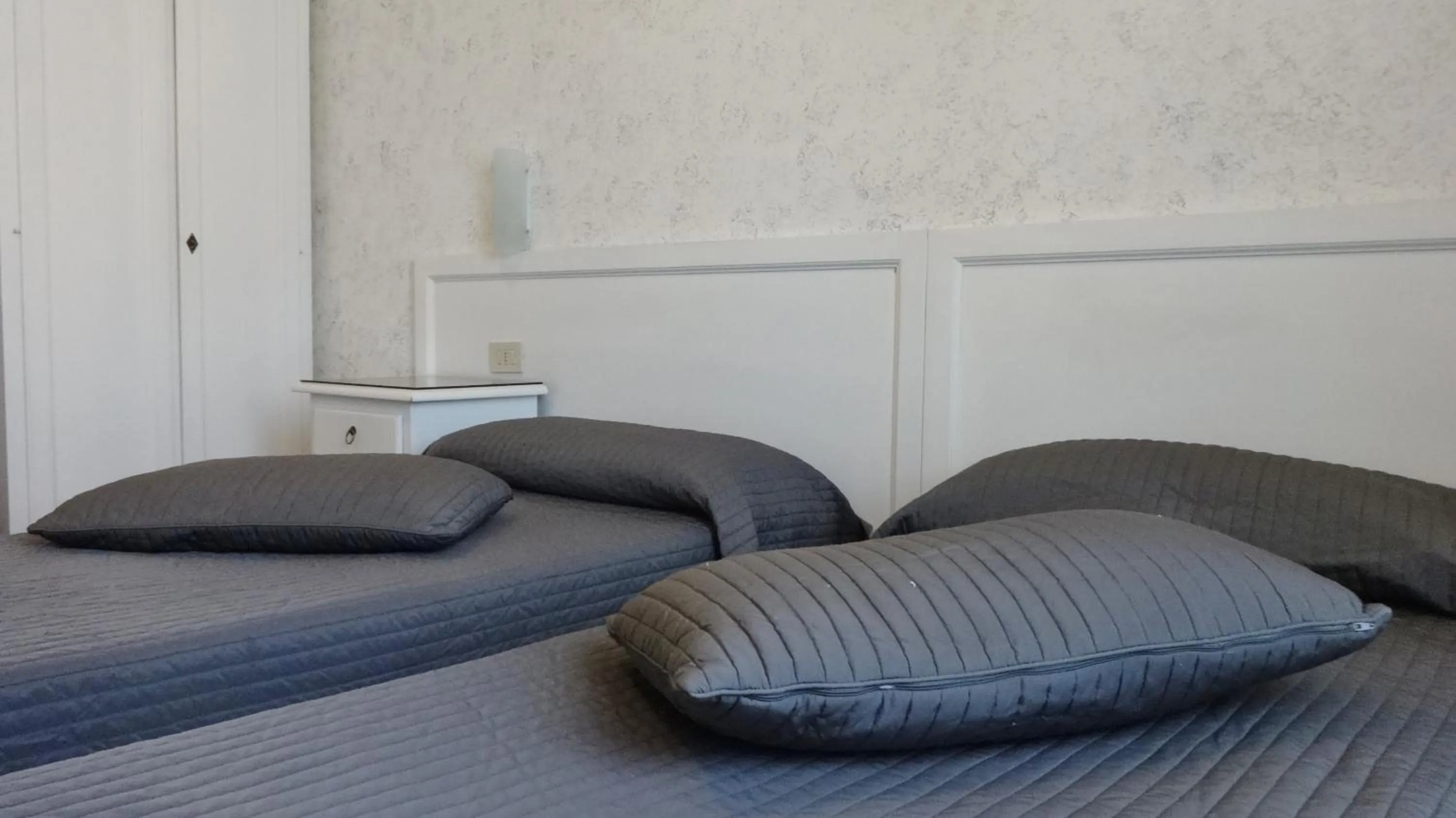 Bed, Seating Area in Hotel Marte