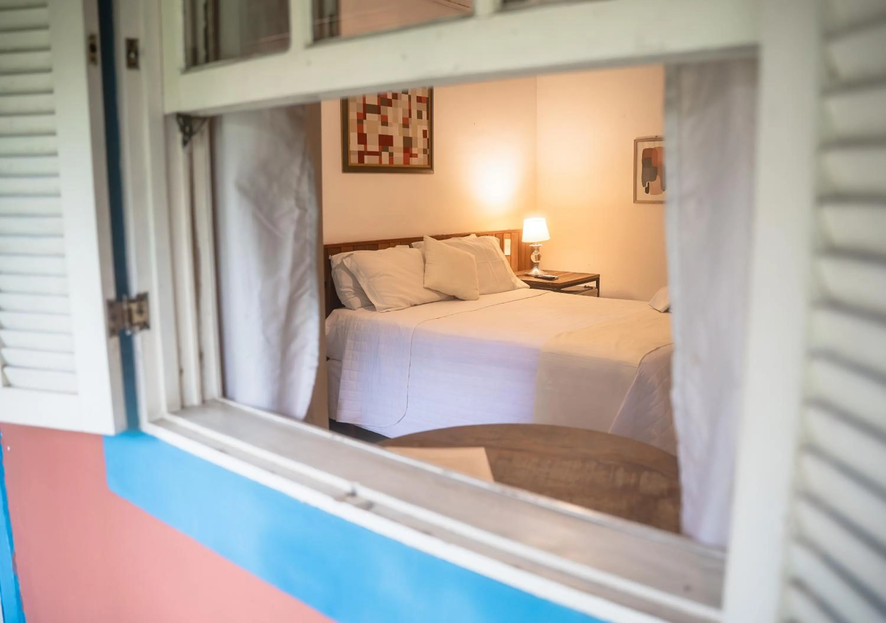 Bed in Pousada Flor de Penedo