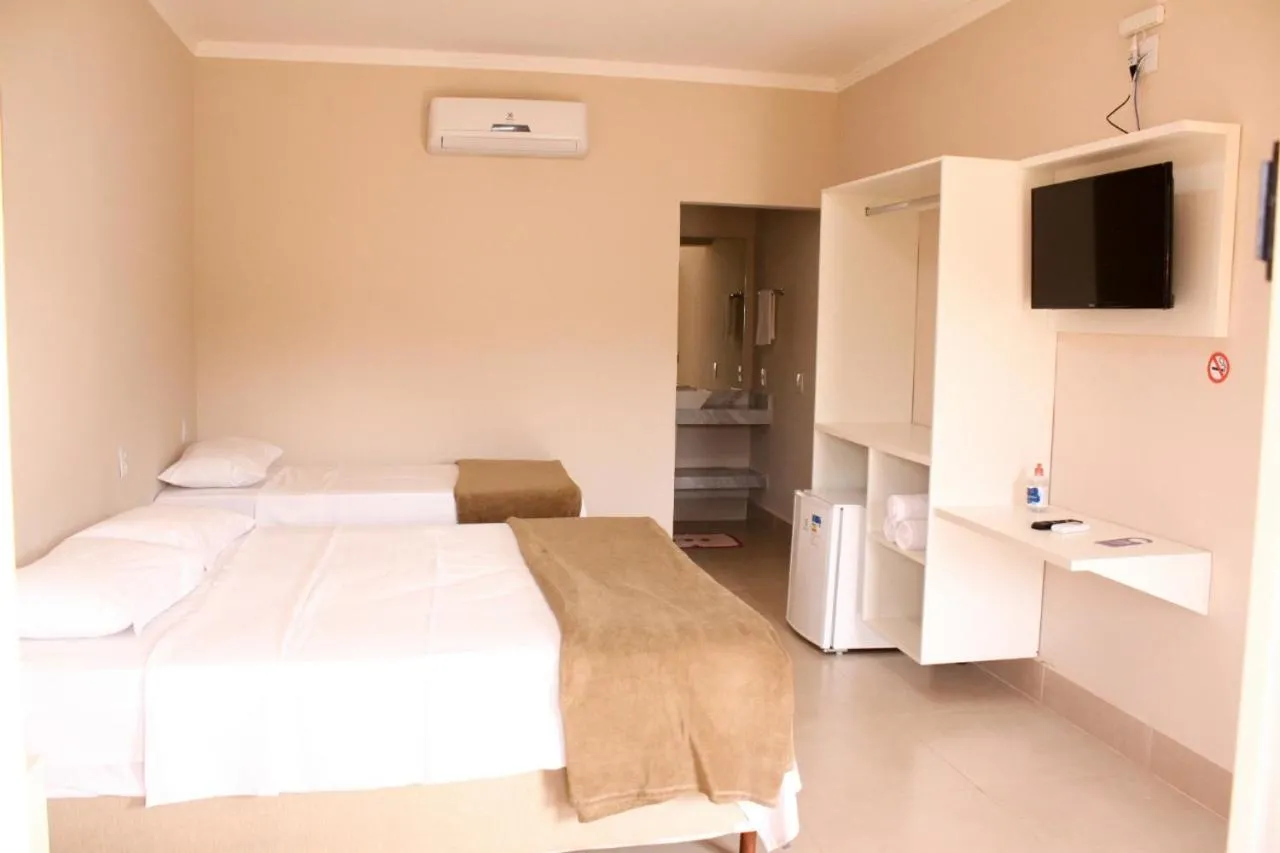 Bed in Chalés Cantinho da Roça