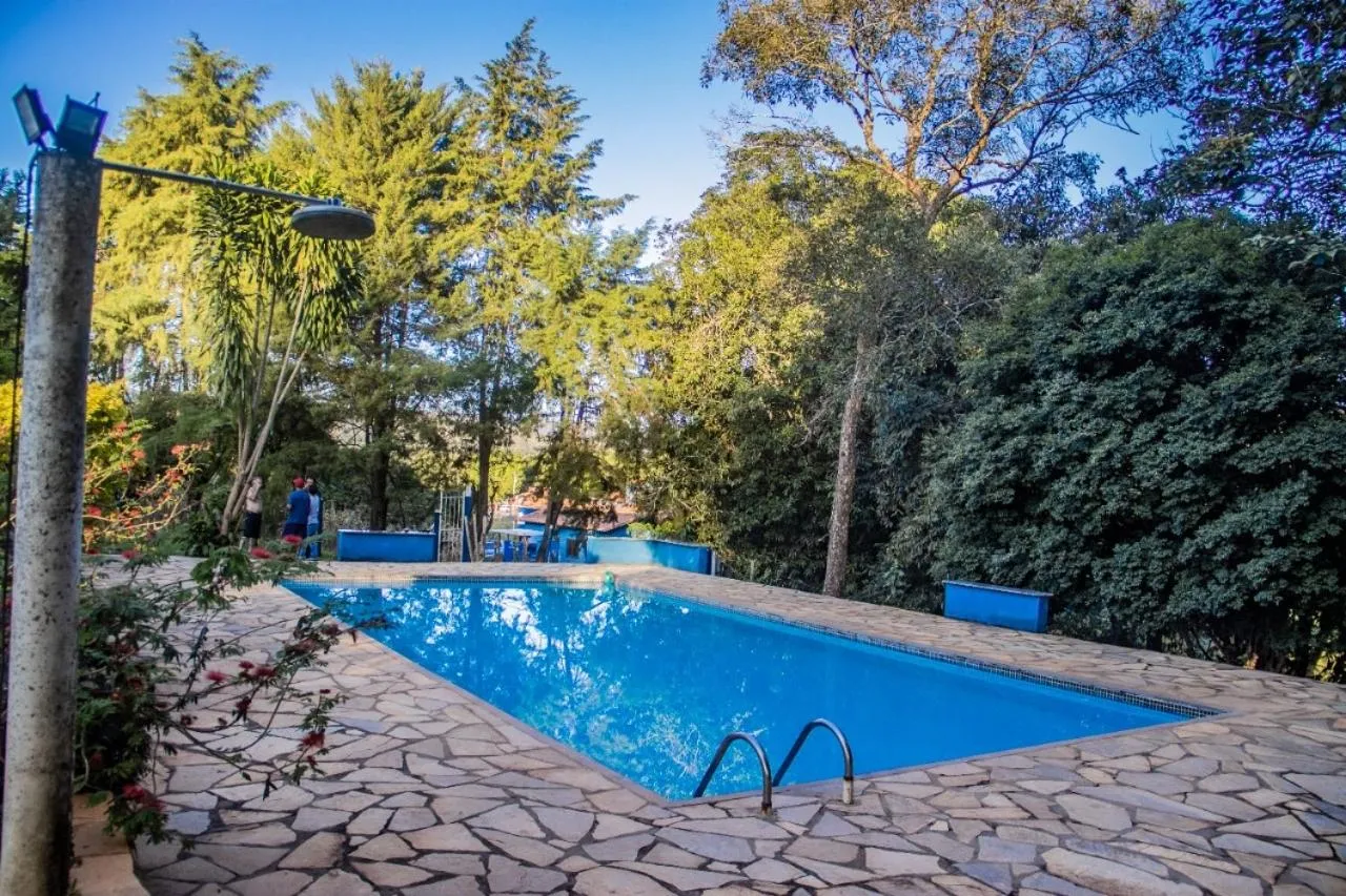 Swimming pool in Chalés Cantinho da Roça