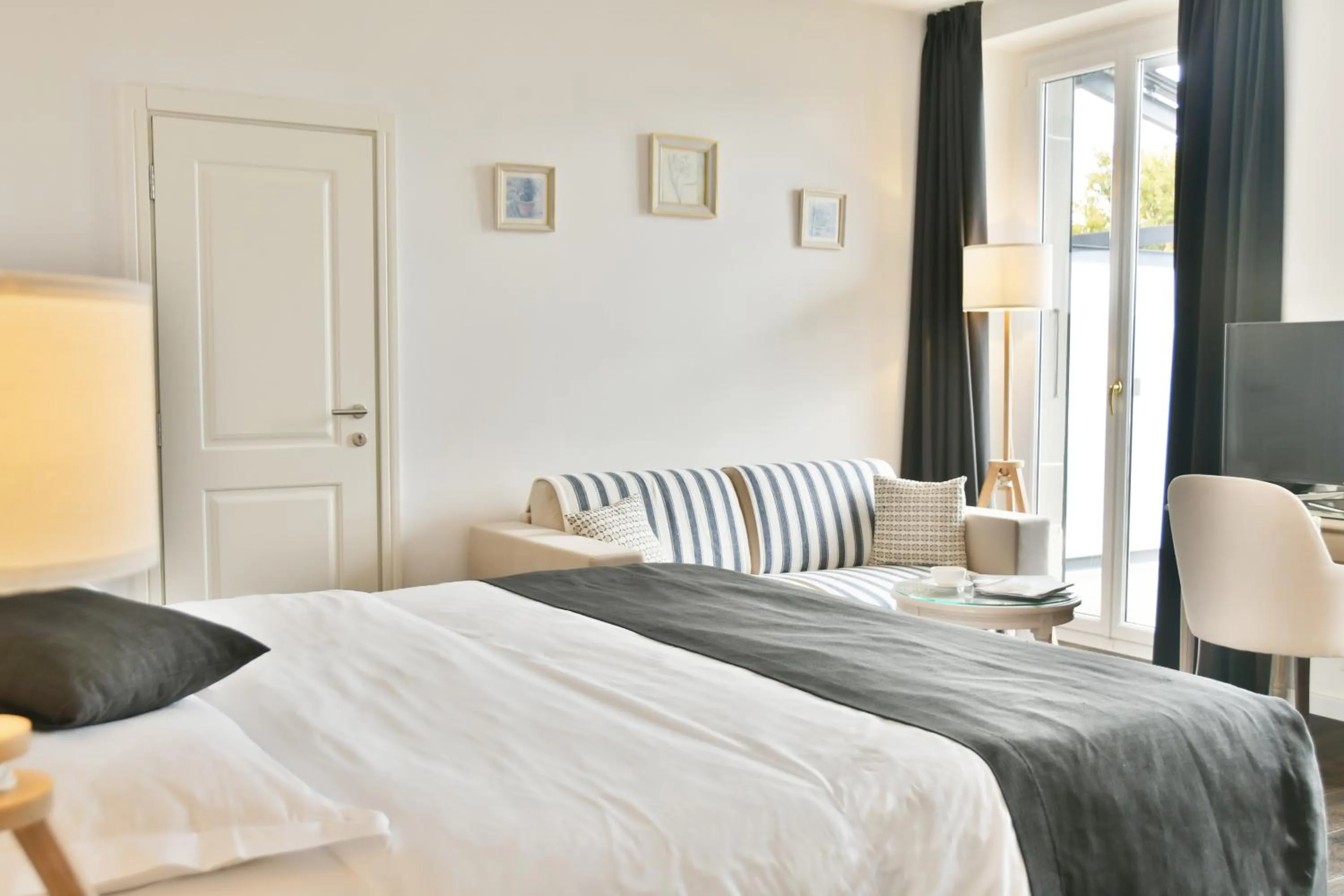 Bed in Baron Tavernier Hotel Restaurant & SPA