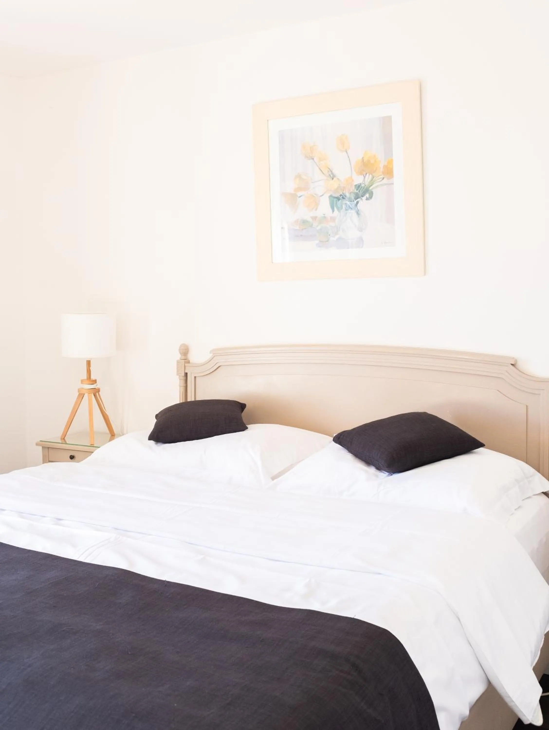 Bed in Baron Tavernier Hotel Restaurant & SPA