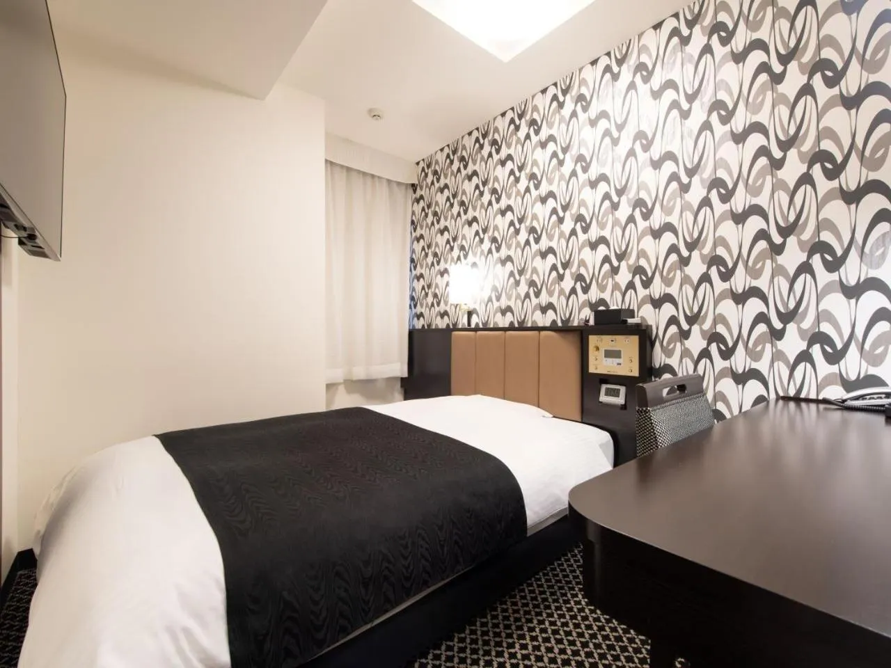 Bed in APA Hotel TKP Tokyo Nishi-Kasai