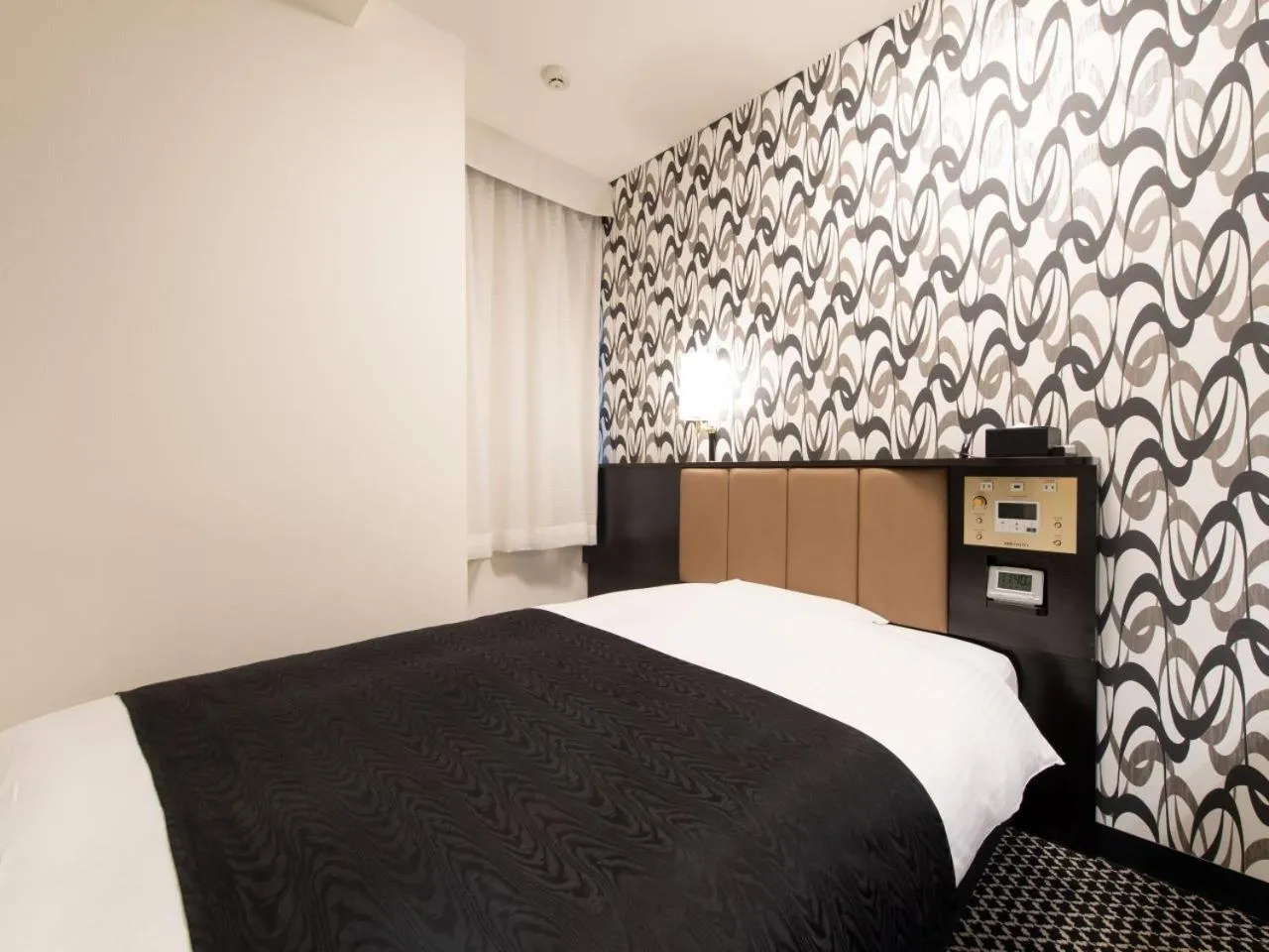 Bed in APA Hotel TKP Tokyo Nishi-Kasai