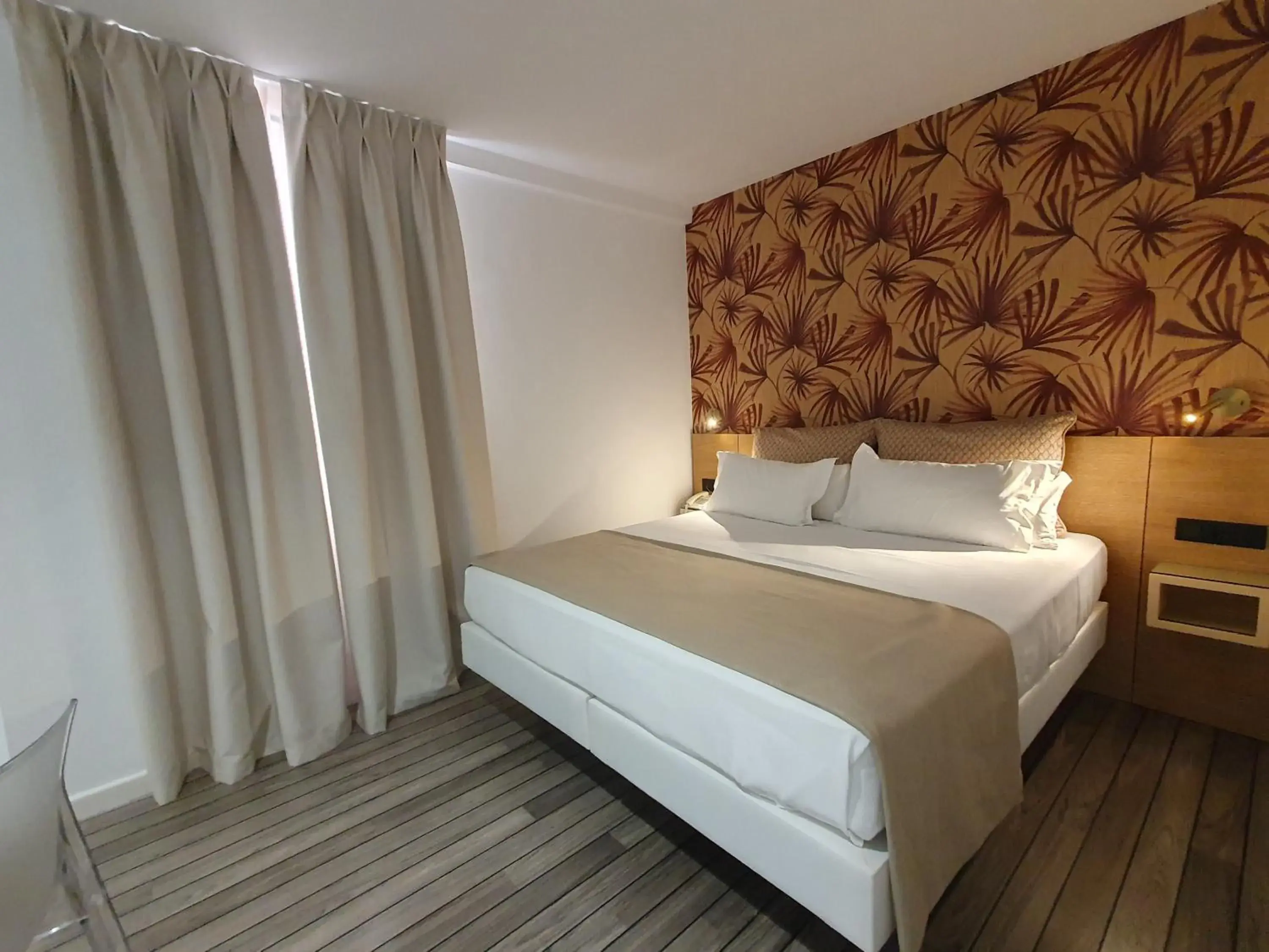 Bed in La Boutique Puerta Osario Bed in La Boutique Puerta Osario