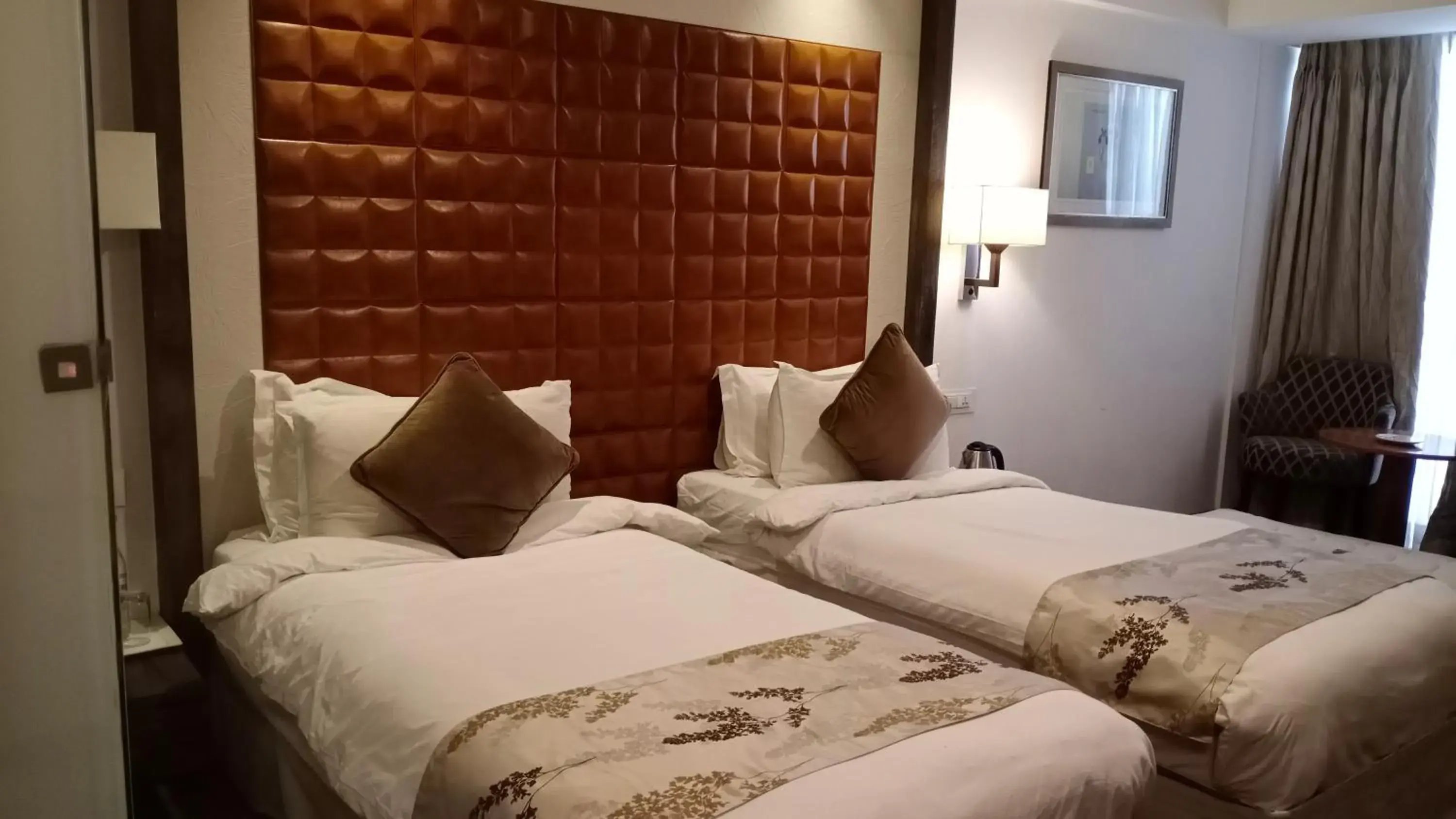 Bedroom, Bed in Regenta Central Hotel & Convention Centre Nagpur Bedroom, Bed in Regenta Central Hotel & Convention Centre Nagpur