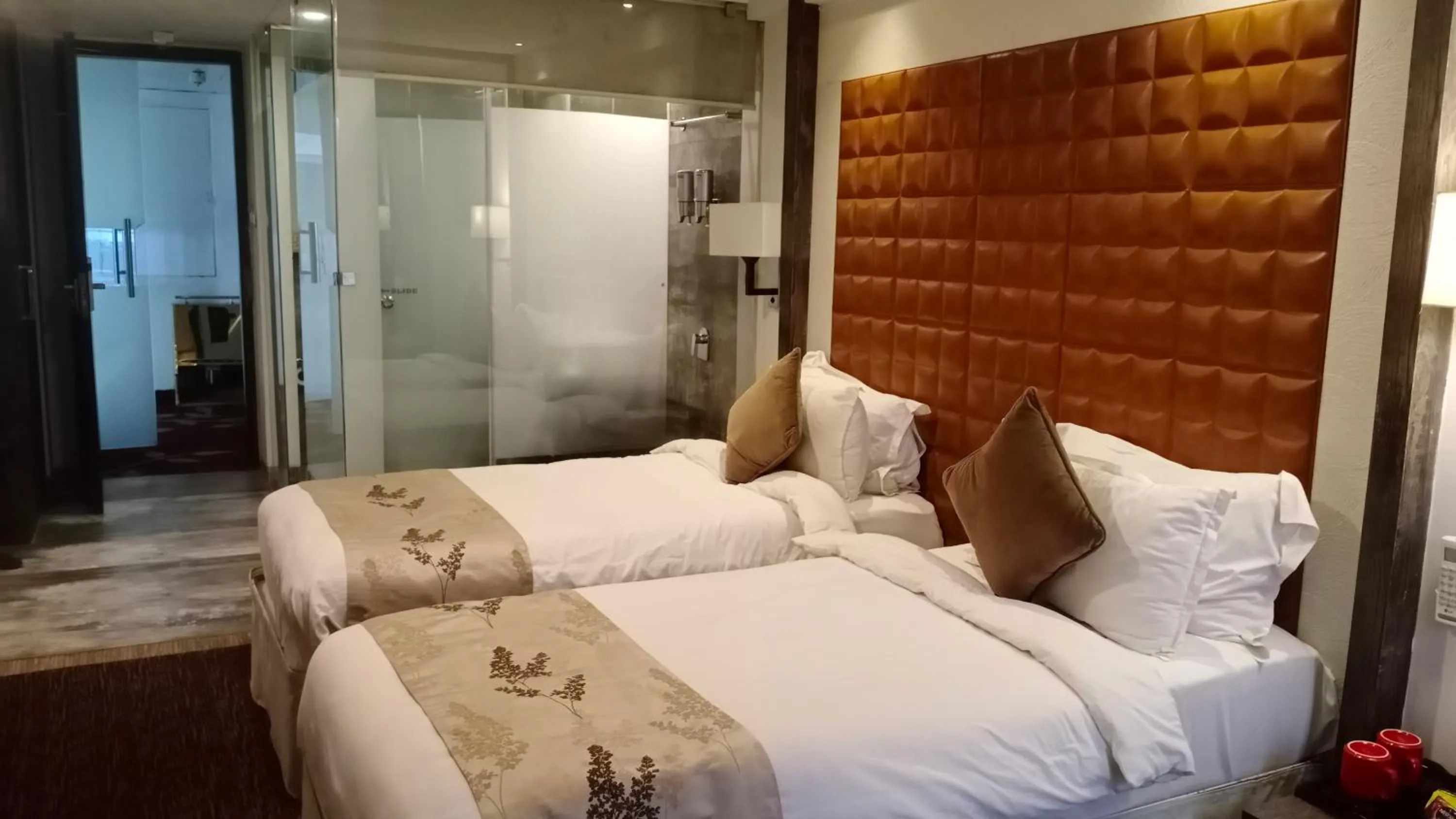 Bedroom, Bed in Regenta Central Hotel & Convention Centre Nagpur