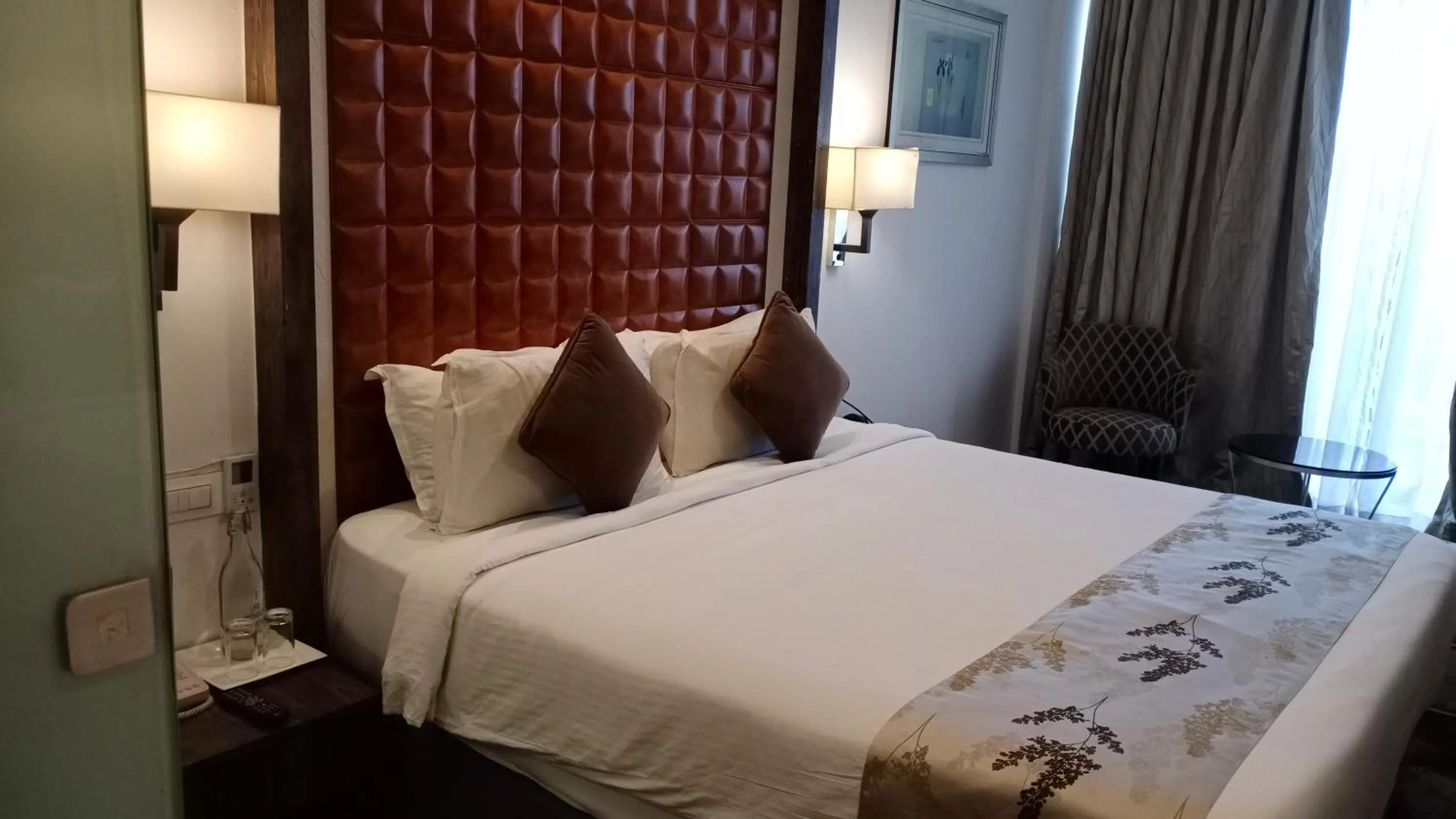 Bed in Regenta Central Hotel & Convention Centre Nagpur