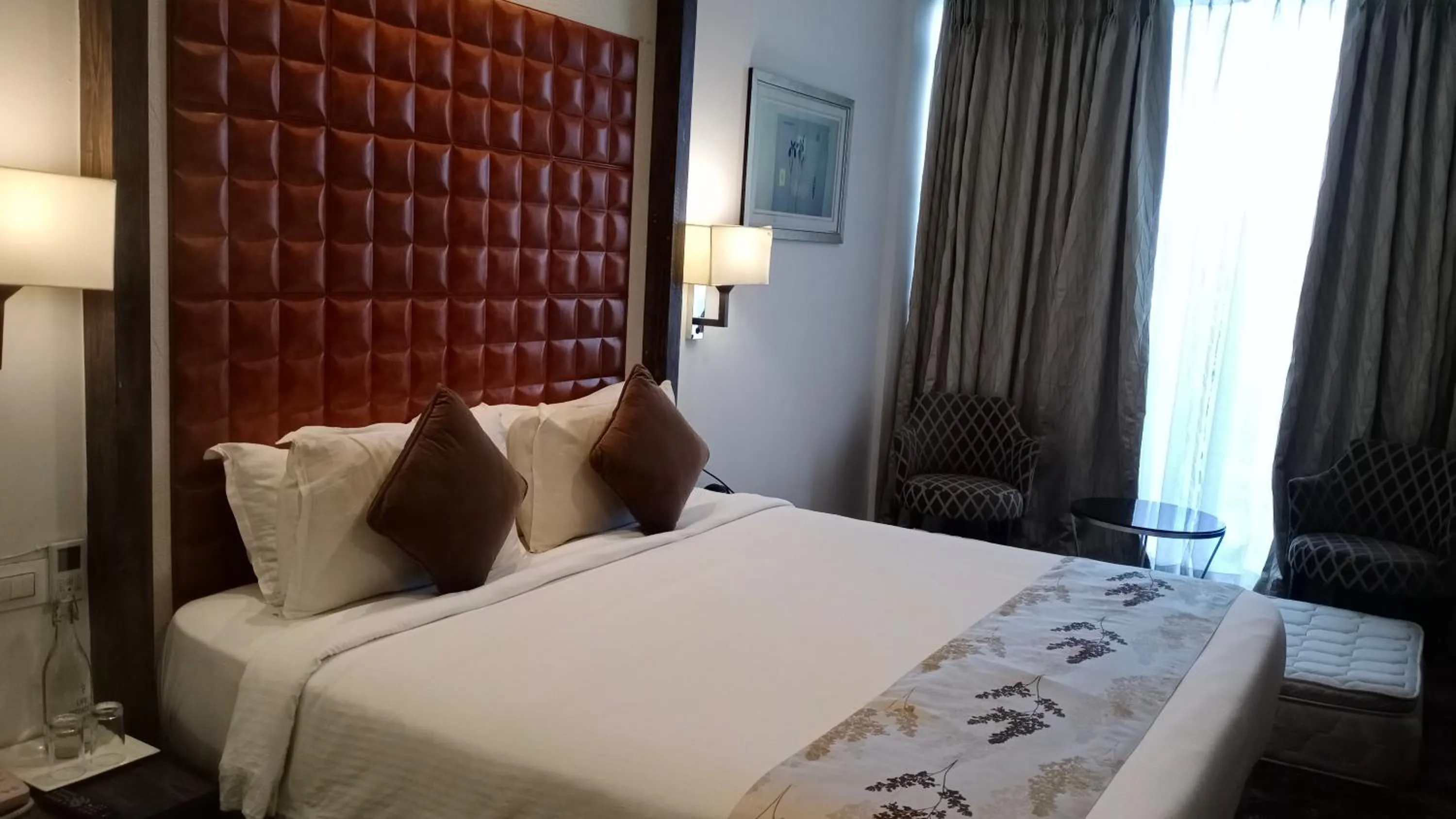 Bedroom, Bed in Regenta Central Hotel & Convention Centre Nagpur