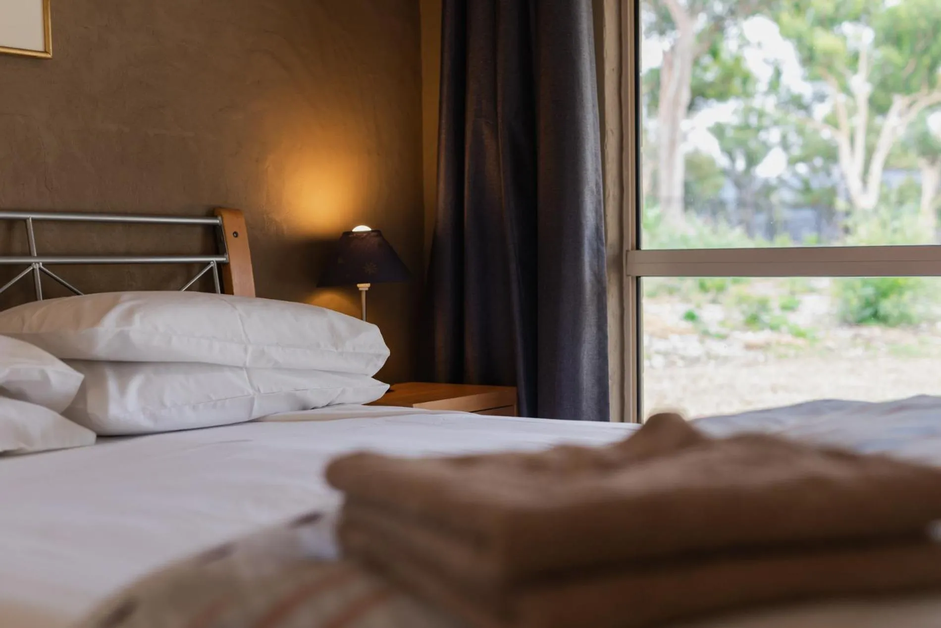 Bed in Banksia Park Cottages